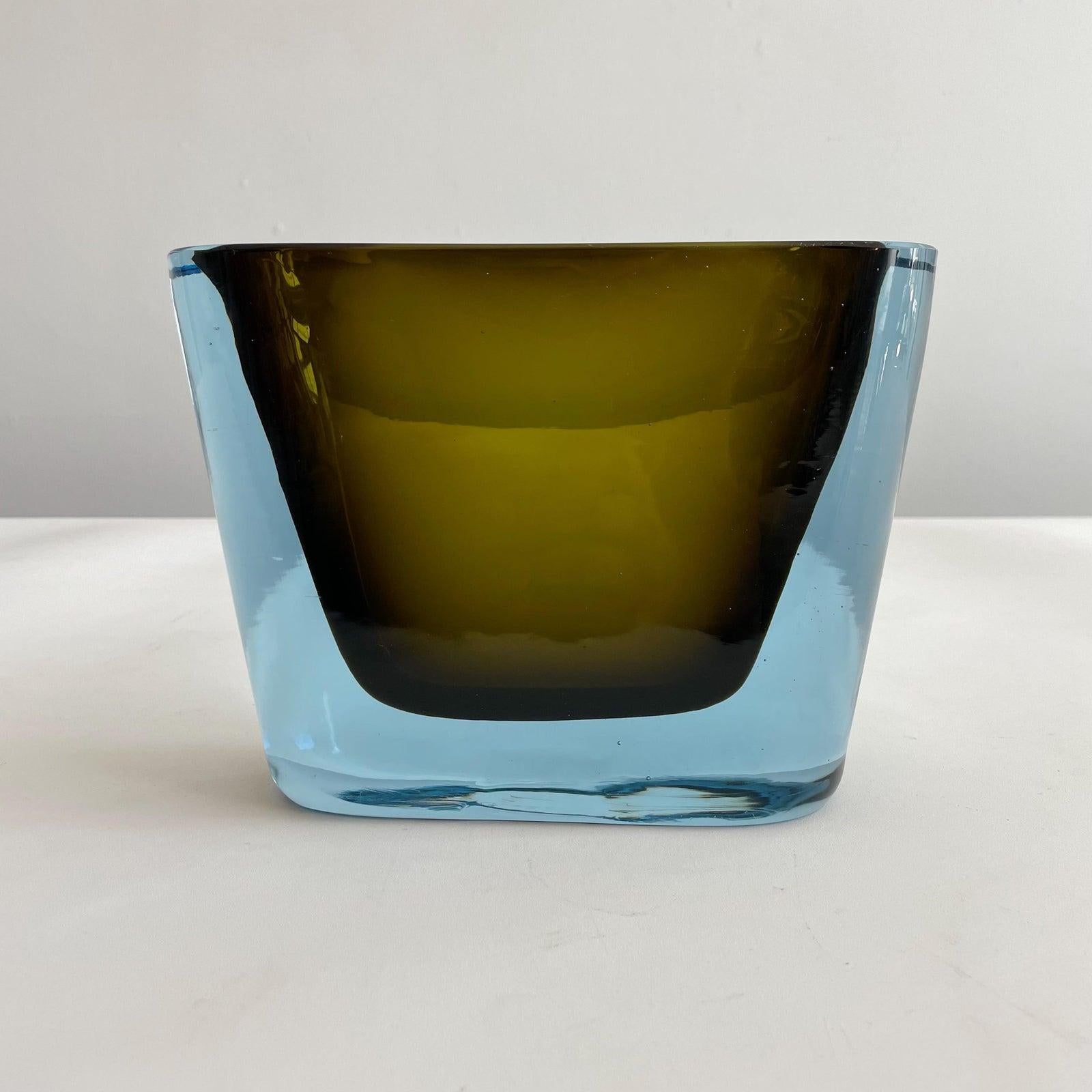 Murano summers glass vase in vibrant blue and amber colors by Antonio Da Ros for Cenedese. Unsigned.

Antonio Da Ros (1936-2012) graduated in 1957 from the Istituto Superiore di Arti Decorative 'Carmini' in Venice, getting the title of Professor