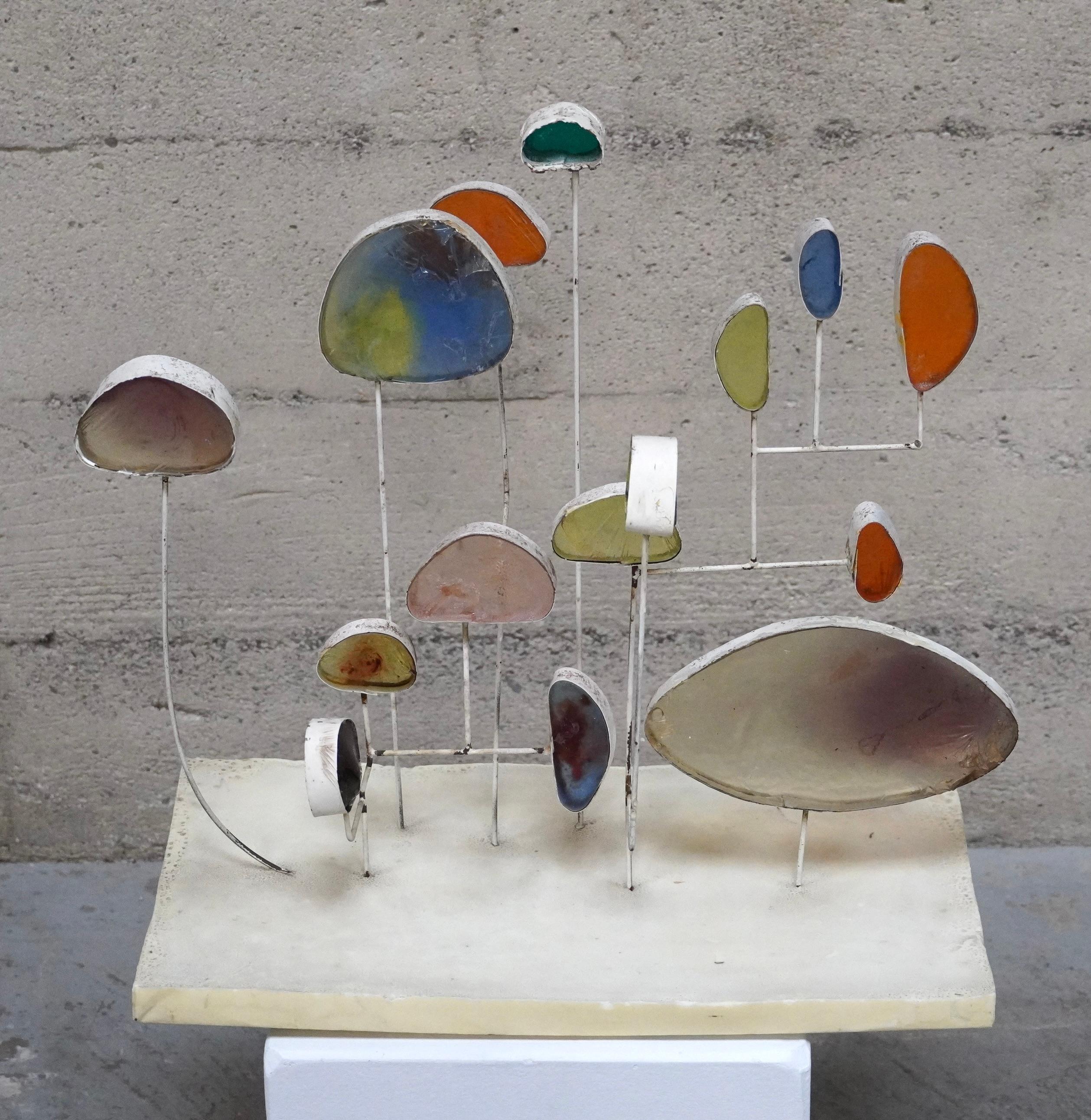 1960s Space Age abstract table top sculpture crafted of resin and metal, with colorful organic forms of cast resin encased in white painted metal housings mounted to a cast resin base. The forms invoke otherworldly life from a distant planet during