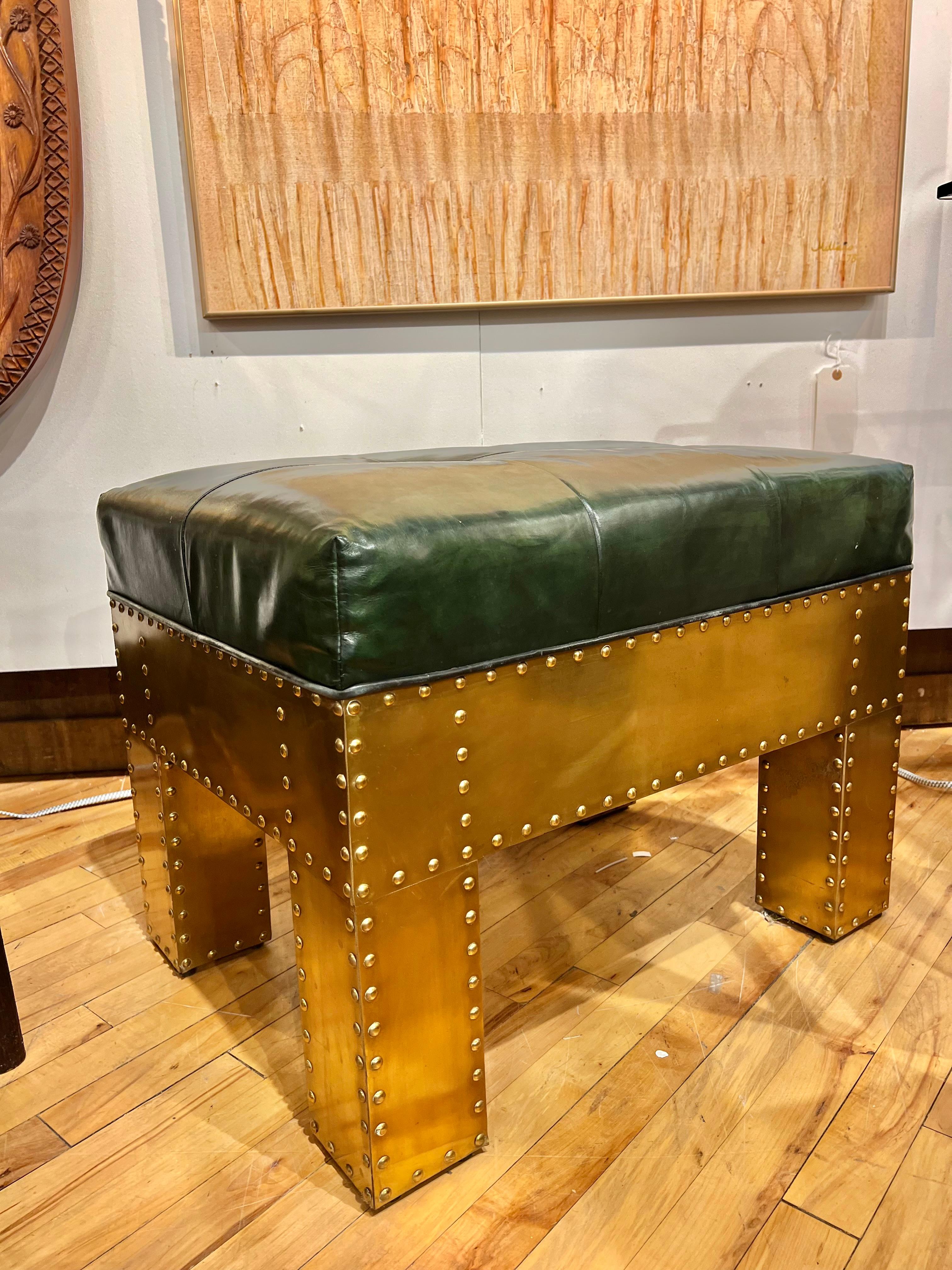 1960’s brass bench with original leather upholstery. Made in Spain. Designed by Sarreid. 
