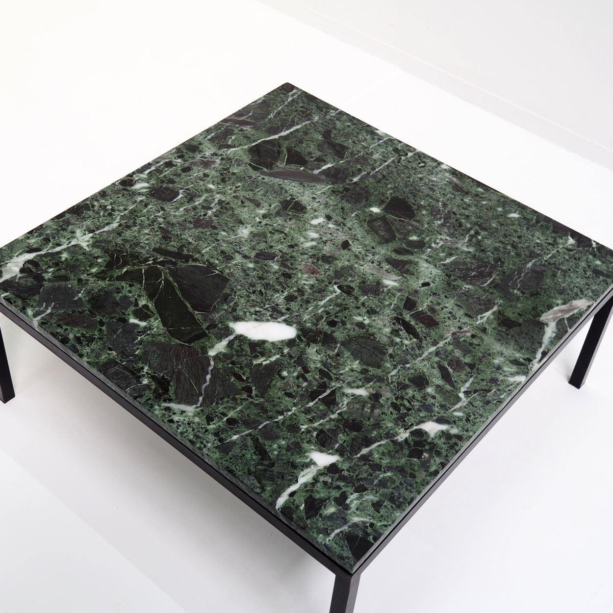 Beautiful sleek coffee table from the 1960s.

The table consists of a black metal frame with a green marble top.

The top has a very lively pattern with all kinds of color nuances. It is the Verdi Alpi marble that originated millions of years ago