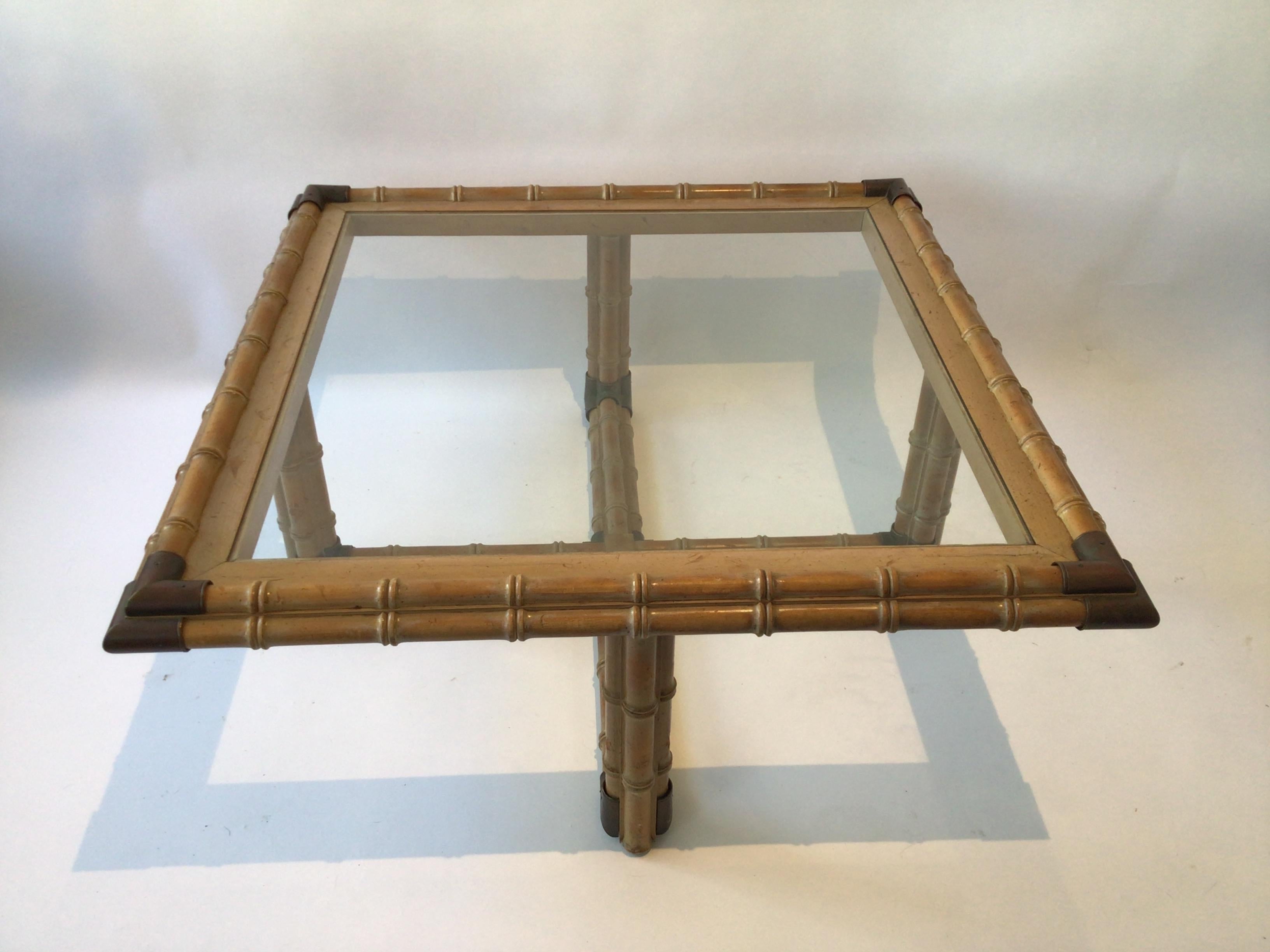 1960s Wood faux bamboo with brass accents coffee table.