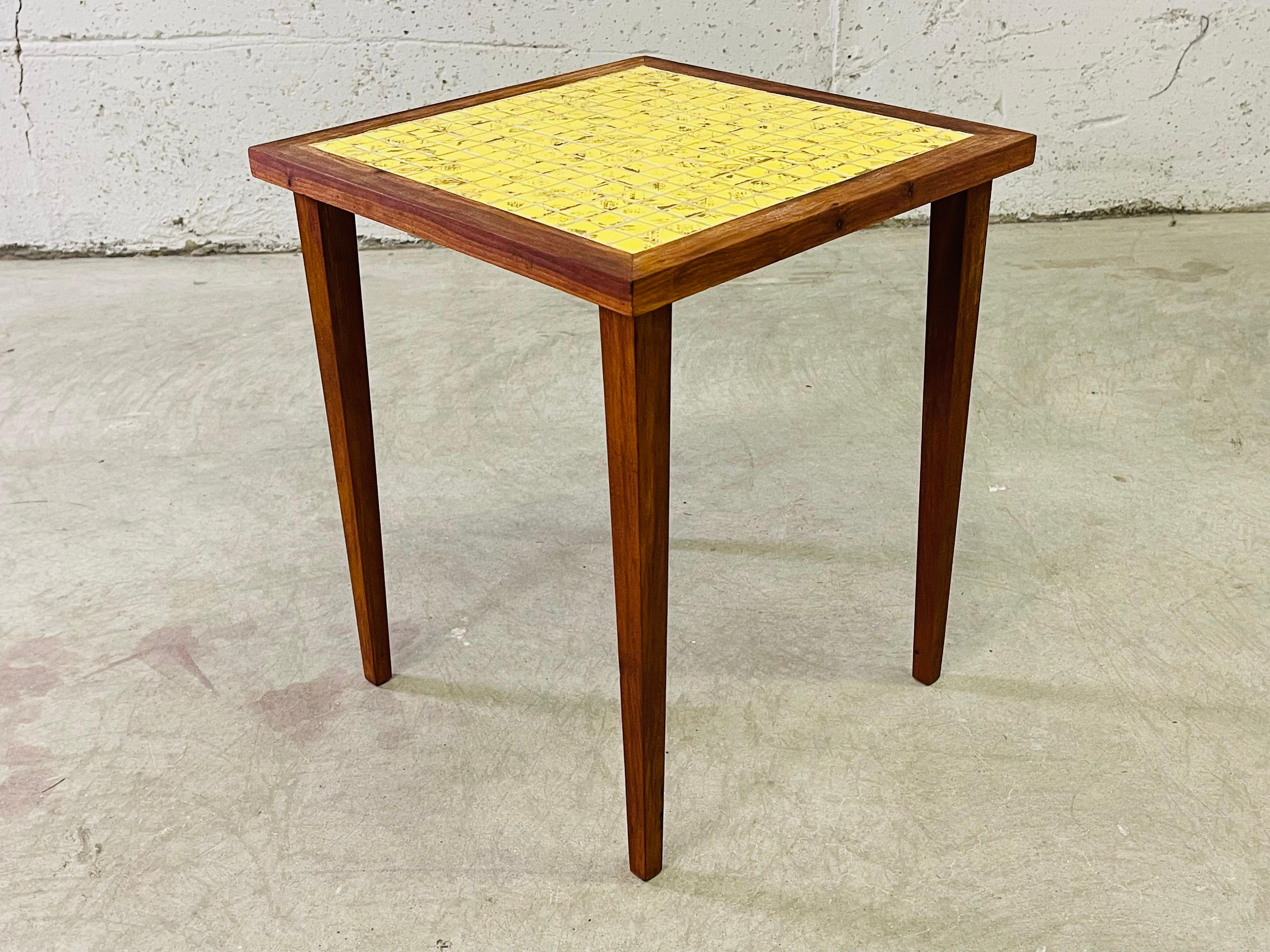 Vintage 1960s yellow and gold square tile top side table on a wood frame. No marks.