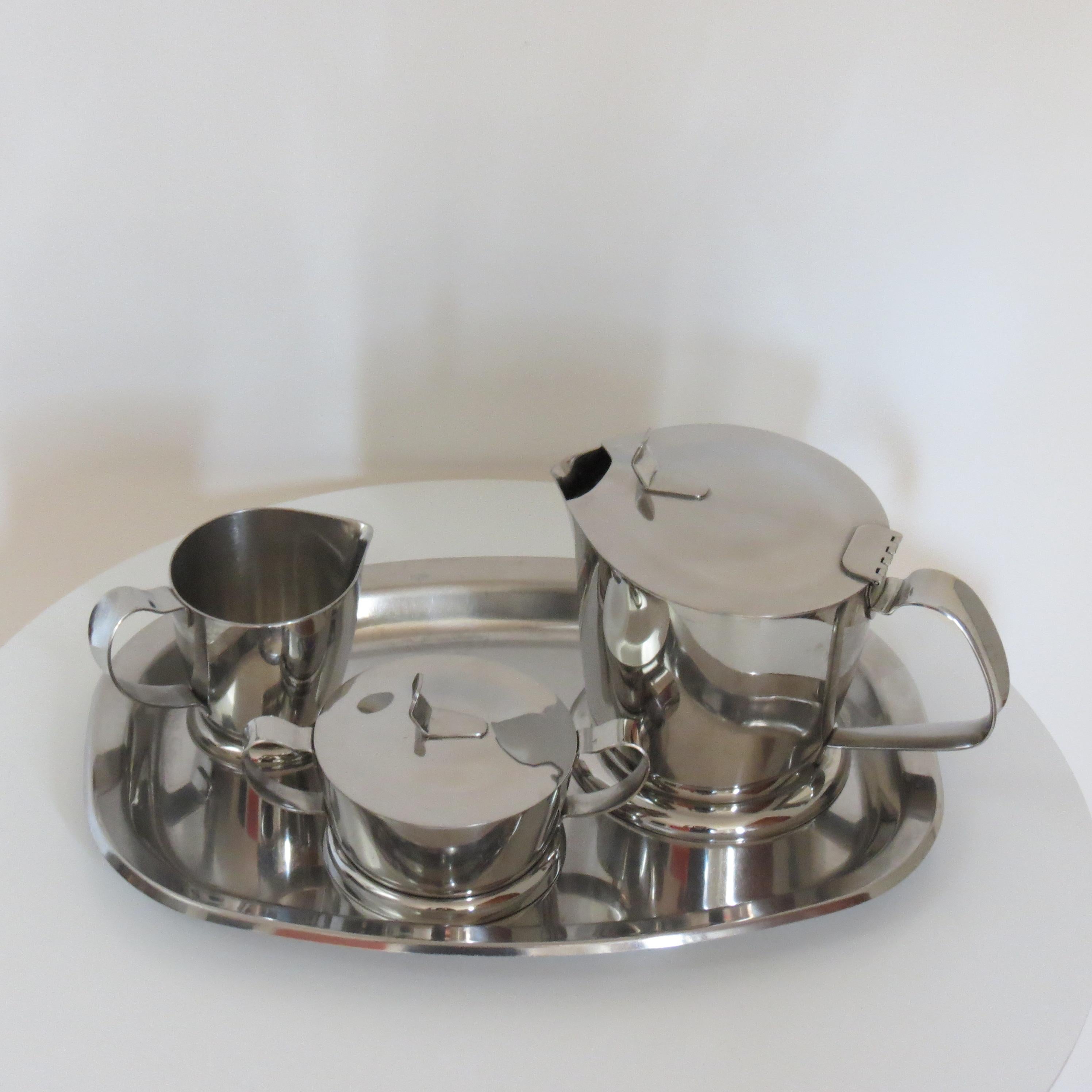 .Very good quality tea set comprising tea pot, lidded sugar bowl, milk jug and tray by Gense of Sweden.

Made from stainless steel.  In good over all condition.  Dates from the 1960s.

Tray measures 31cm long 22.5cm wide 2cm tall.

Teapot