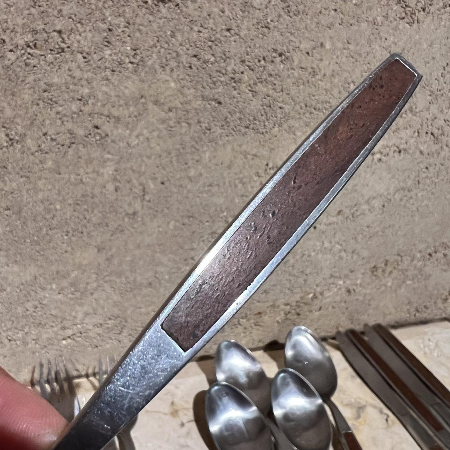 Vintage Stanley Roberts Modern Flatware Stainless Wood Insert Set
Service for Four
Stamped Pasadena Japan SRI
Knife .25 thick x .75 h x 9 Spoon 1 h x 1.75 x 7.5 long
Small spoon, .75 h x 1.25 w x 6.25 long
Fork .75 h x 1 w x 7.5 long Salad fork .5 h