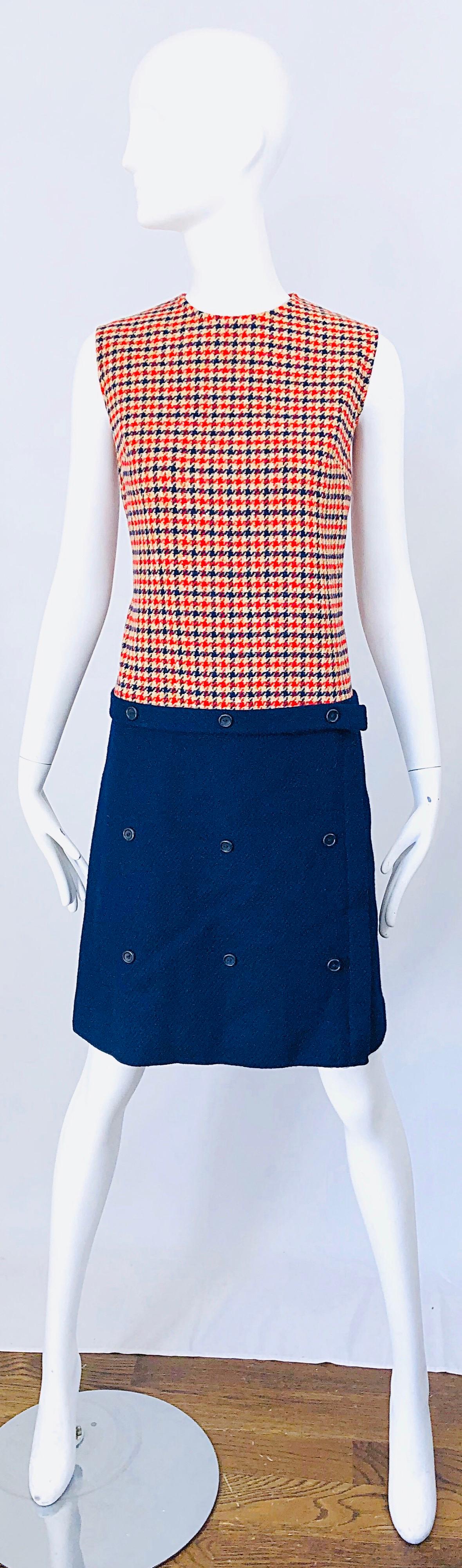 Chic 1960s STANLEY WYLLINS red, ivory and navy blue checkered wool mod shift dress! Features an ivory and red checkered bodice and navy blue skirt. Buttons featured on the front of the skirt, and buttons down the back bodice. Can easily be worn day