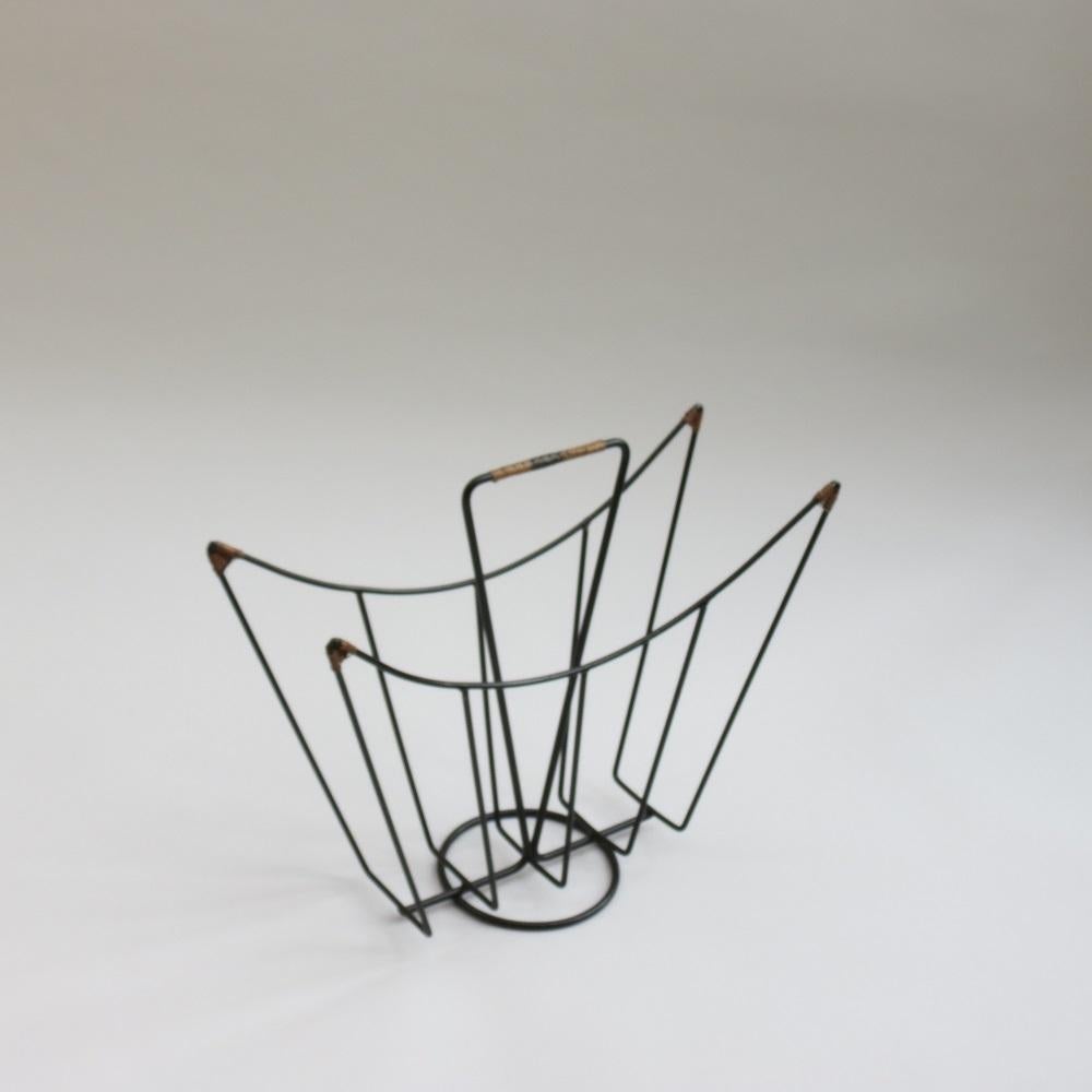 English 1960s Steel and Rattan Magazine Rack By Desmond Sawyer  For Sale