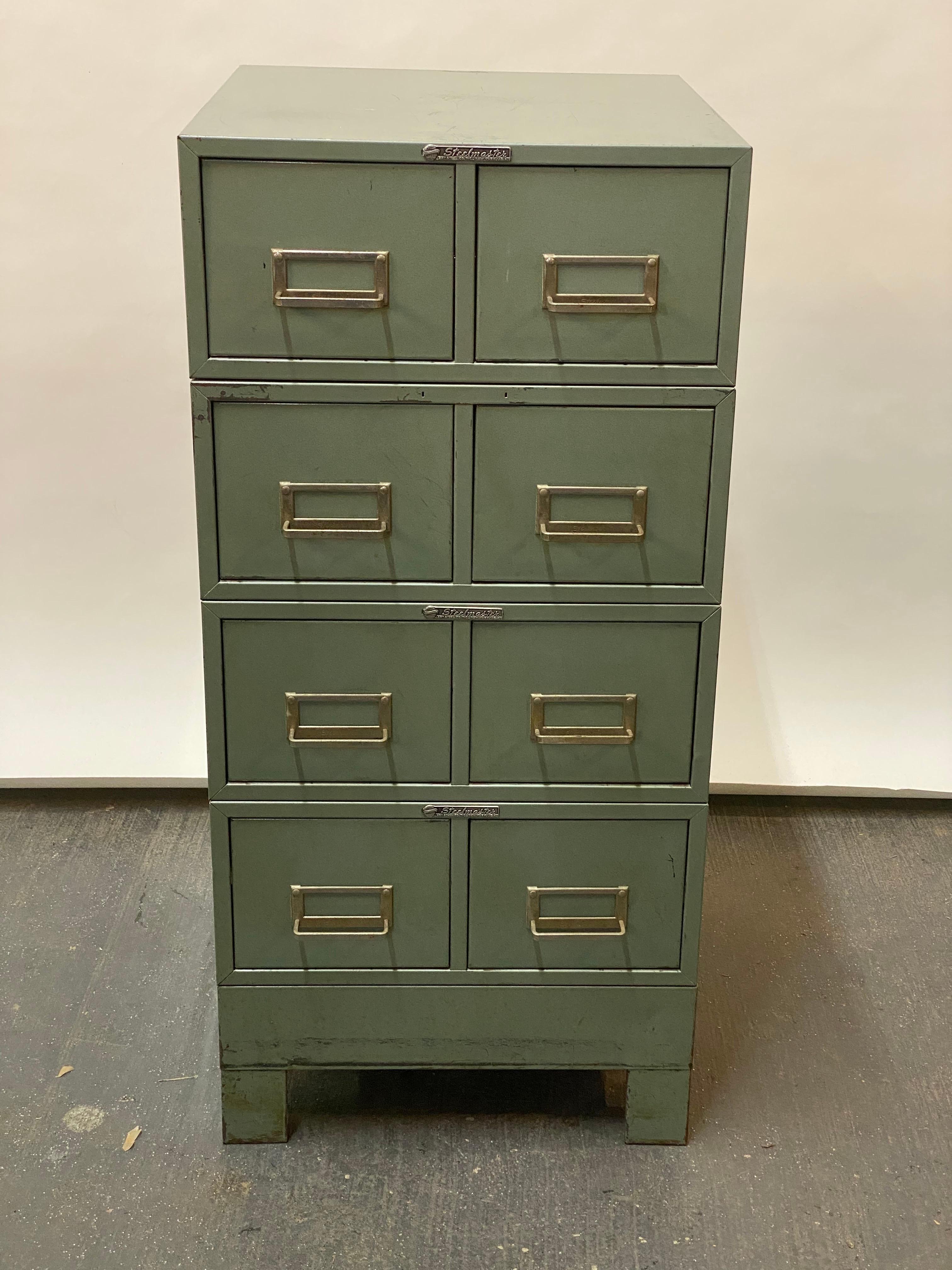 Set of four interlocking and stacking green metallic Steelmaster card file cabinets. Steelmaster, Art Steel Co., New York, USA. Each stack has two drawers. Their interiors measure approximately 6.25