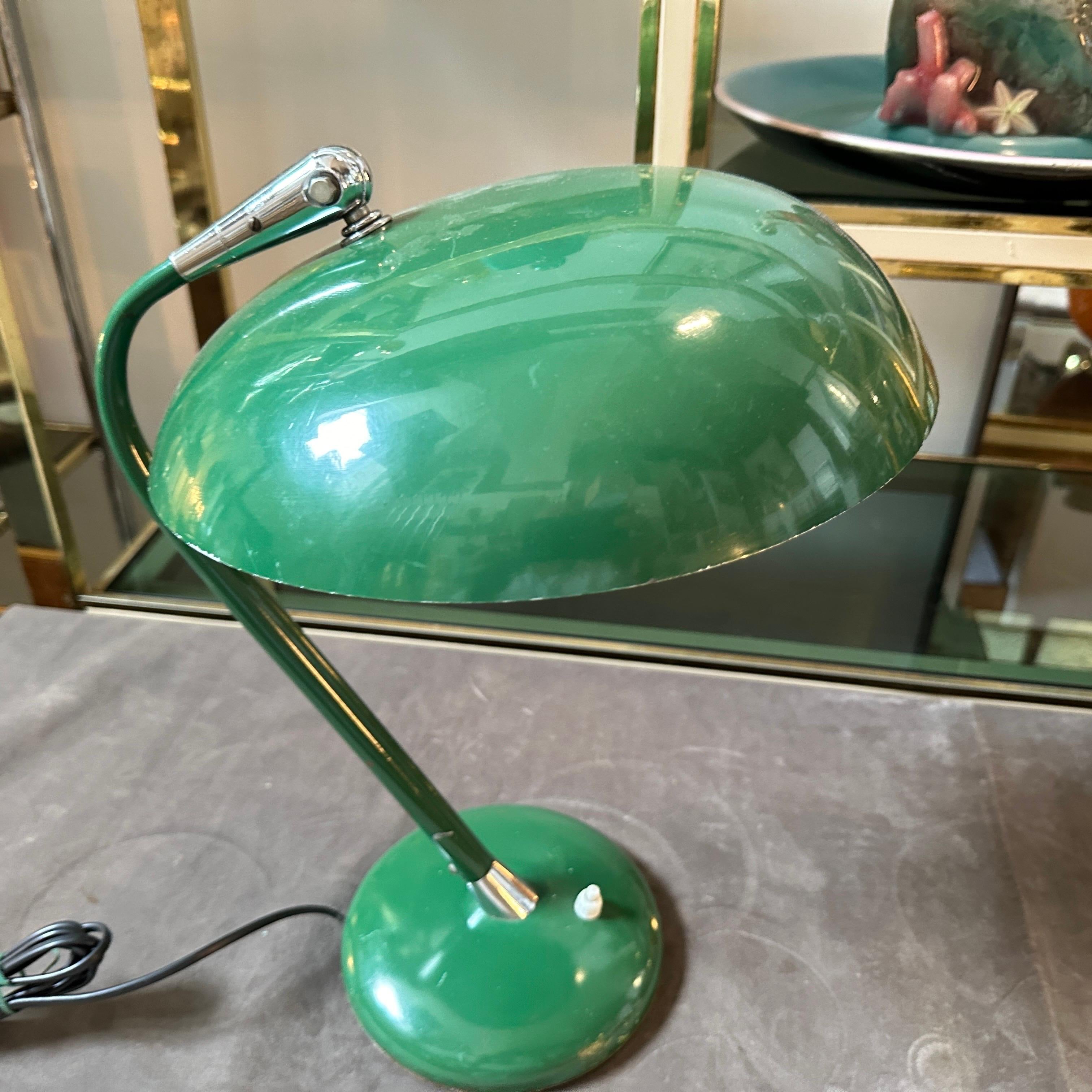 A desk lamp designed and manufactured in Italy in the Sixties in the manner of Stilnovo. Lamp is in good condition overall an ithas been rewired. The design prioritizes both form and function, with a focus on clean lines, geometric shapes, and a