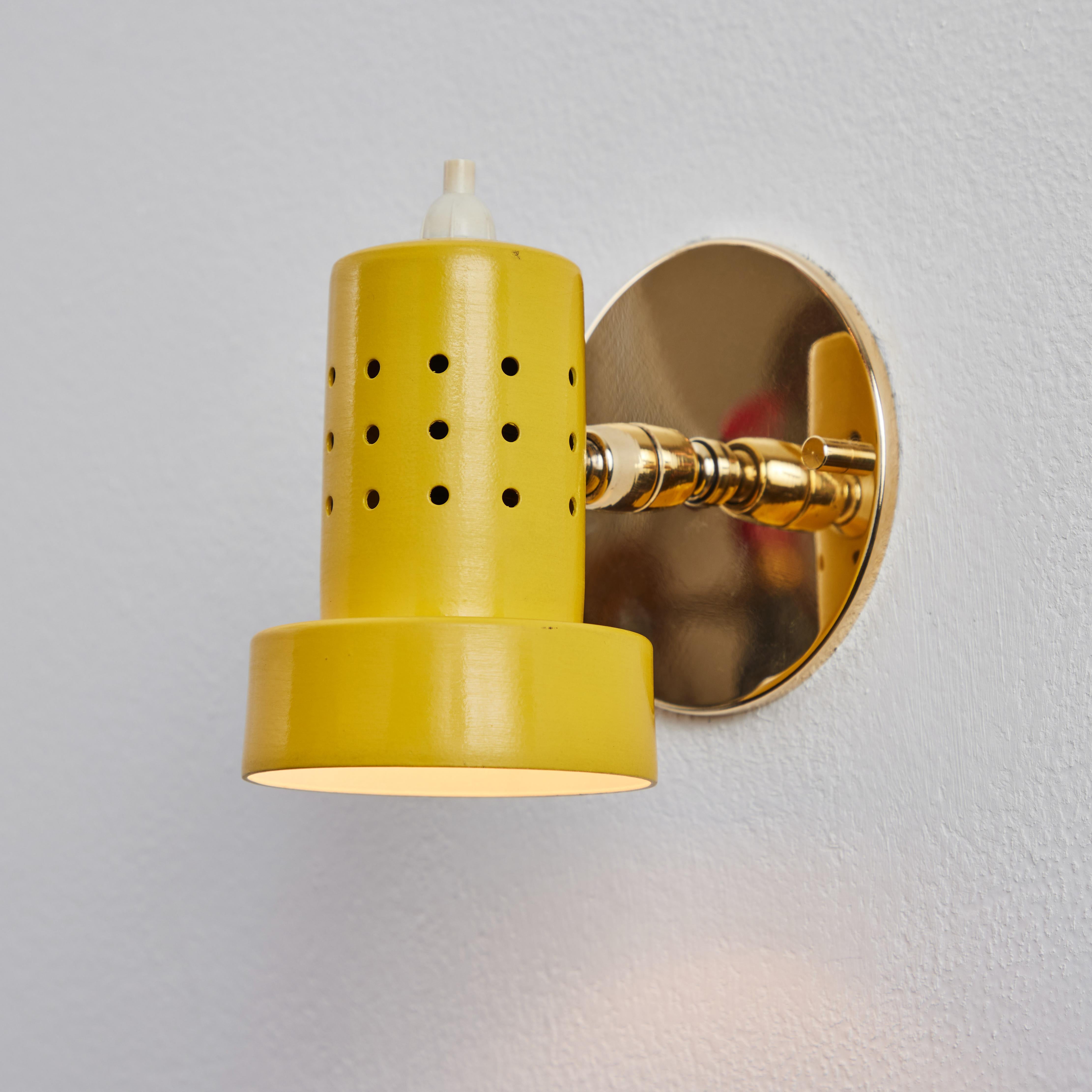 Mid-Century Modern 1960s Stilux Milano Perforated Yellow Articulating Sconce For Sale