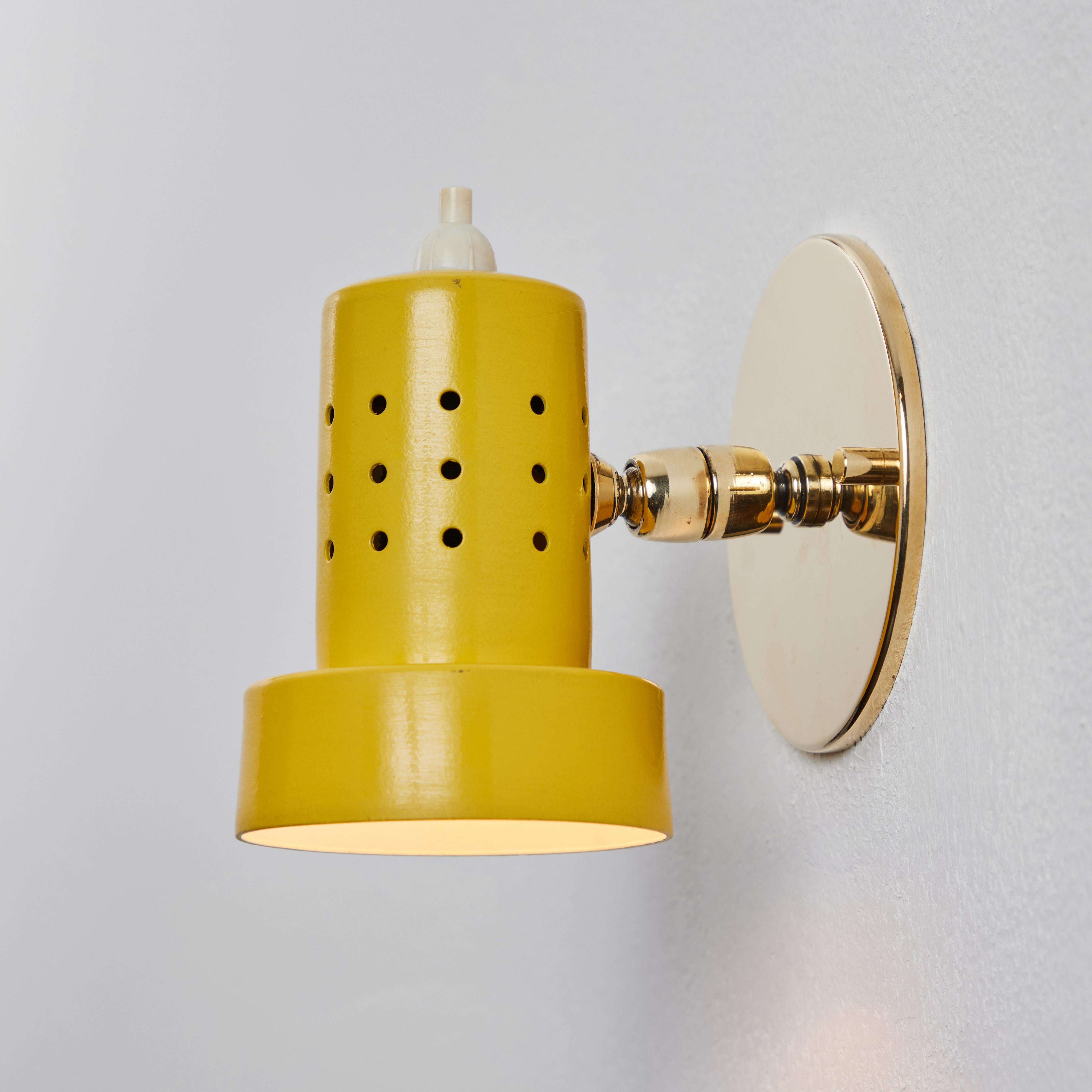 Italian 1960s Stilux Milano Perforated Yellow Articulating Sconce For Sale