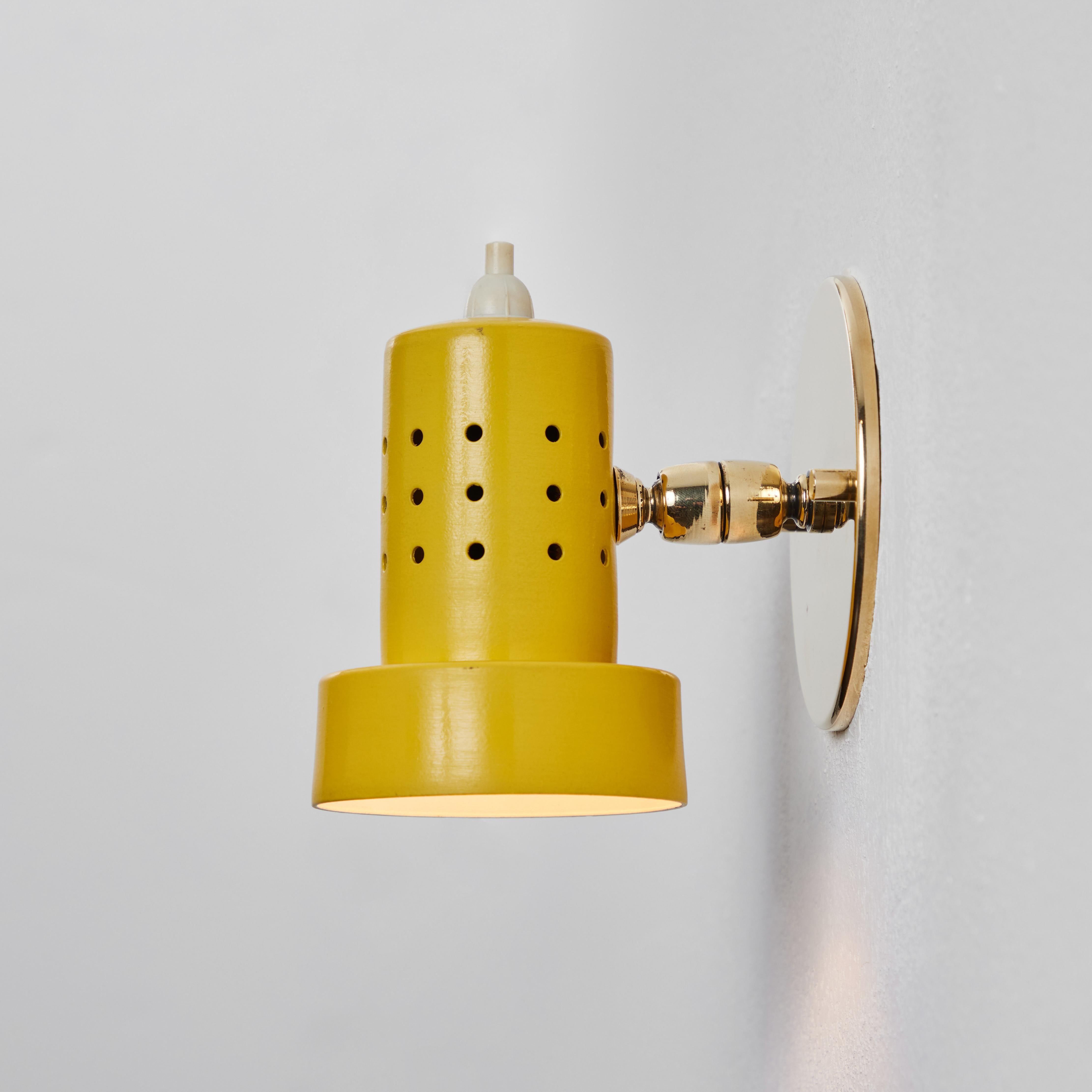 Painted 1960s Stilux Milano Perforated Yellow Articulating Sconce For Sale