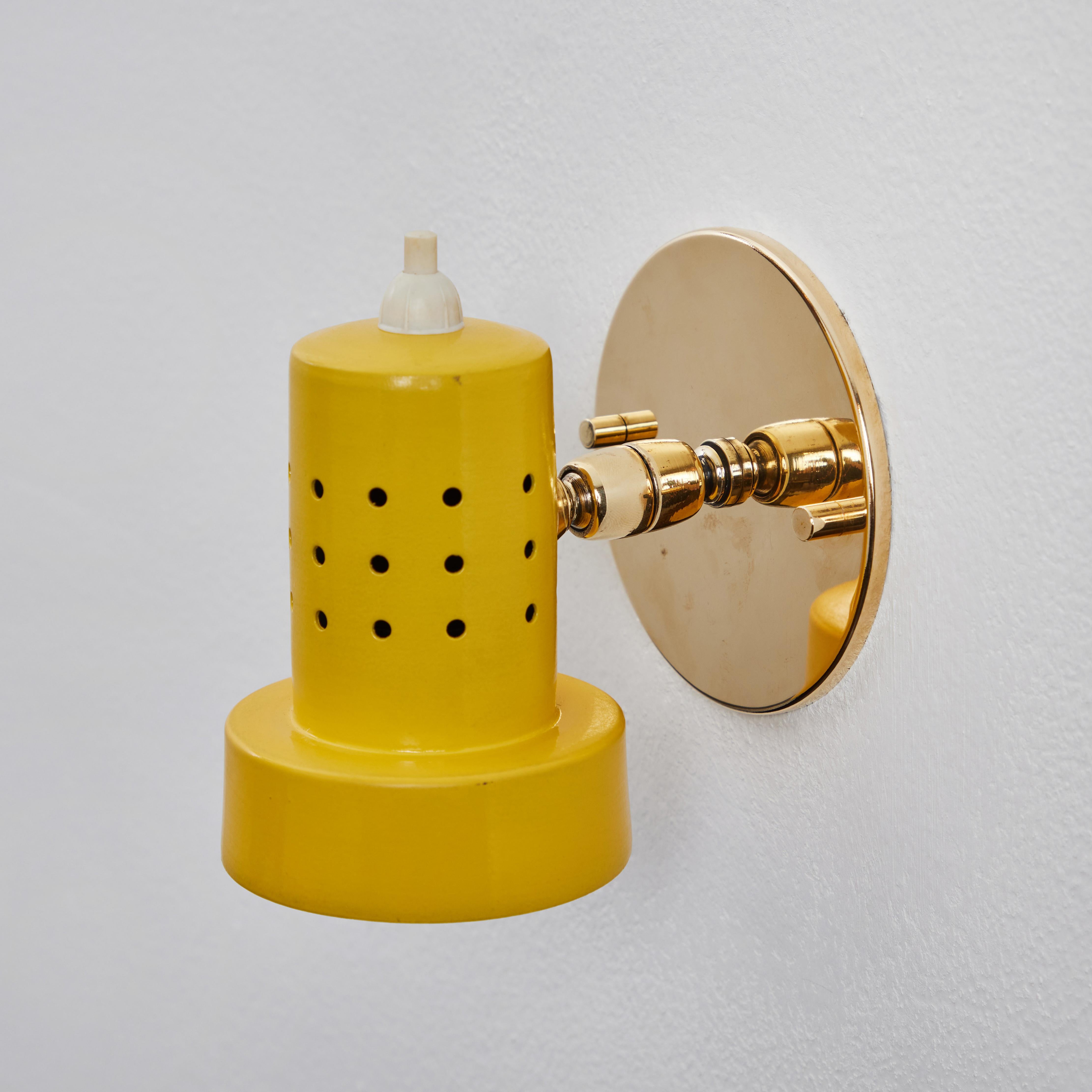 1960s Stilux Milano Perforated Yellow Articulating Sconce In Good Condition For Sale In Glendale, CA