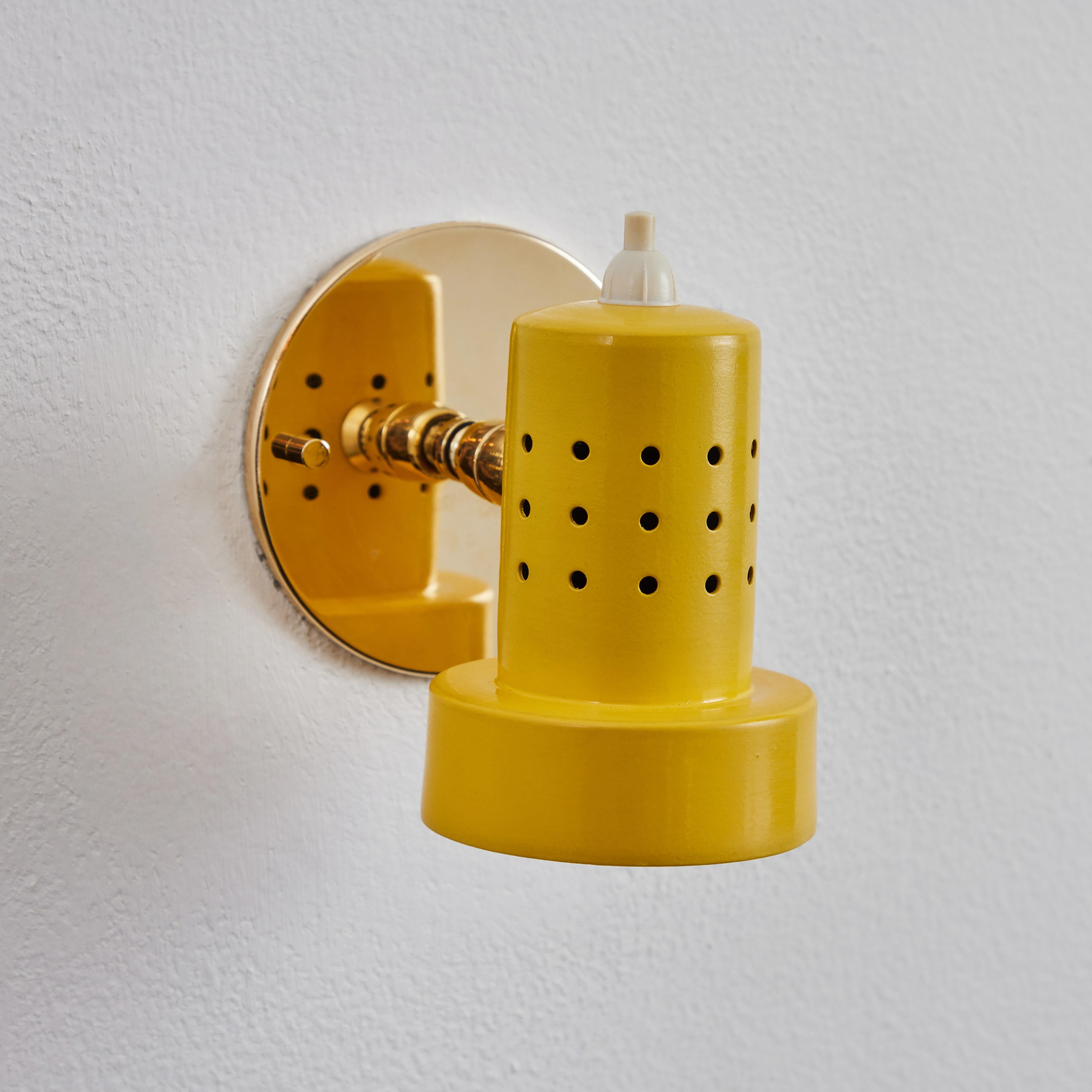 Mid-20th Century 1960s Stilux Milano Perforated Yellow Articulating Sconce For Sale