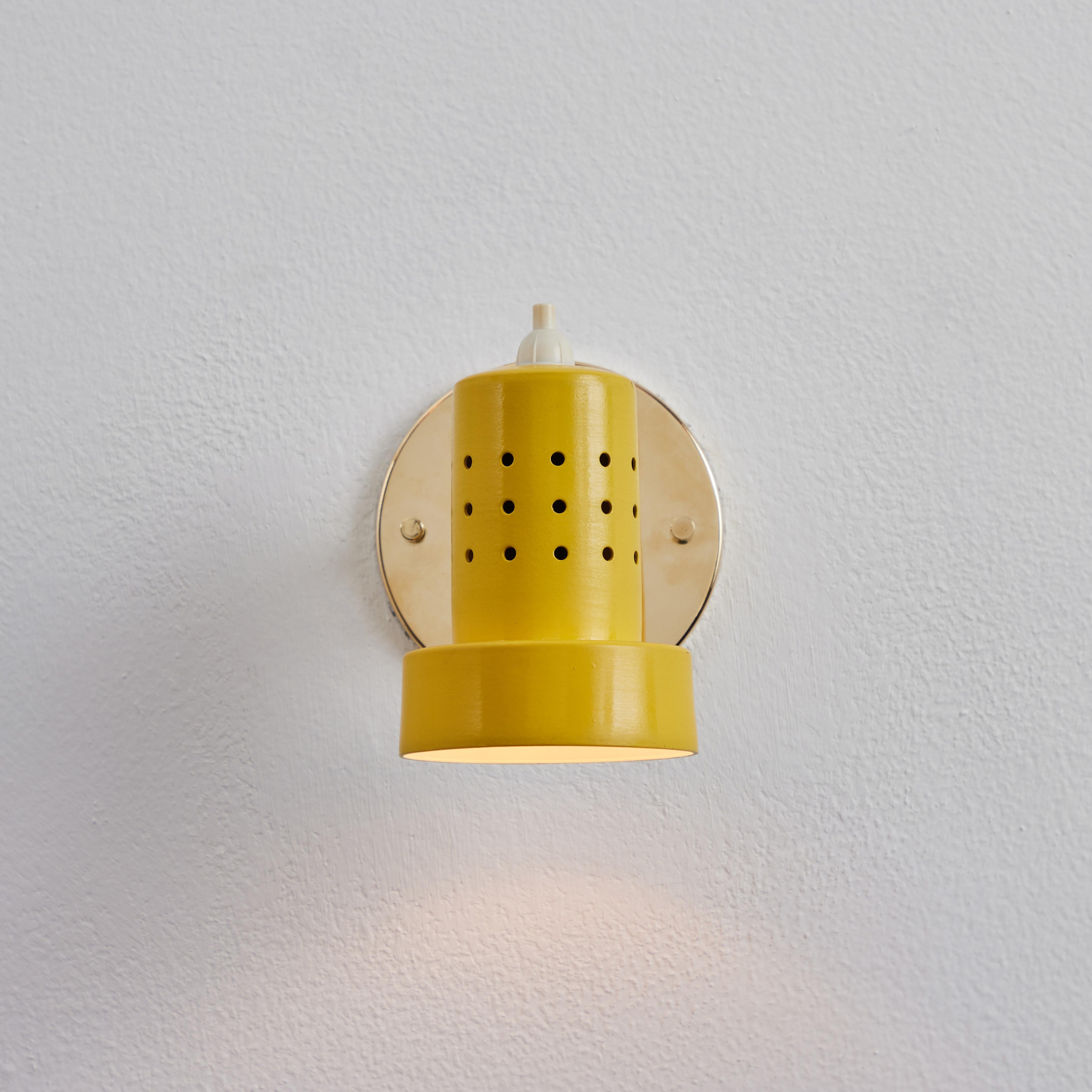 Aluminum 1960s Stilux Milano Perforated Yellow Articulating Sconce For Sale