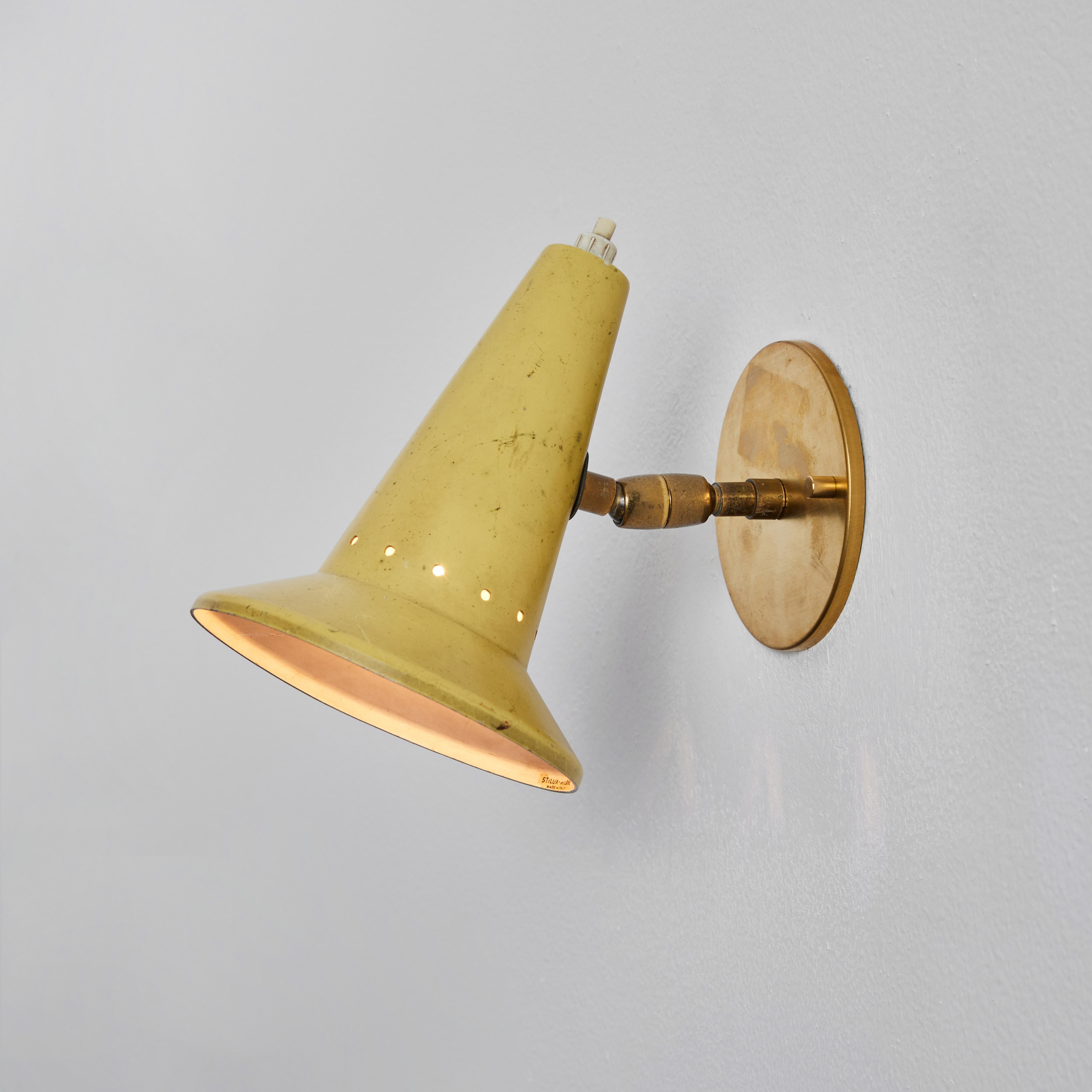 1960s Stilux Milano Yellow Perforated Articulating Sconce In Good Condition In Glendale, CA