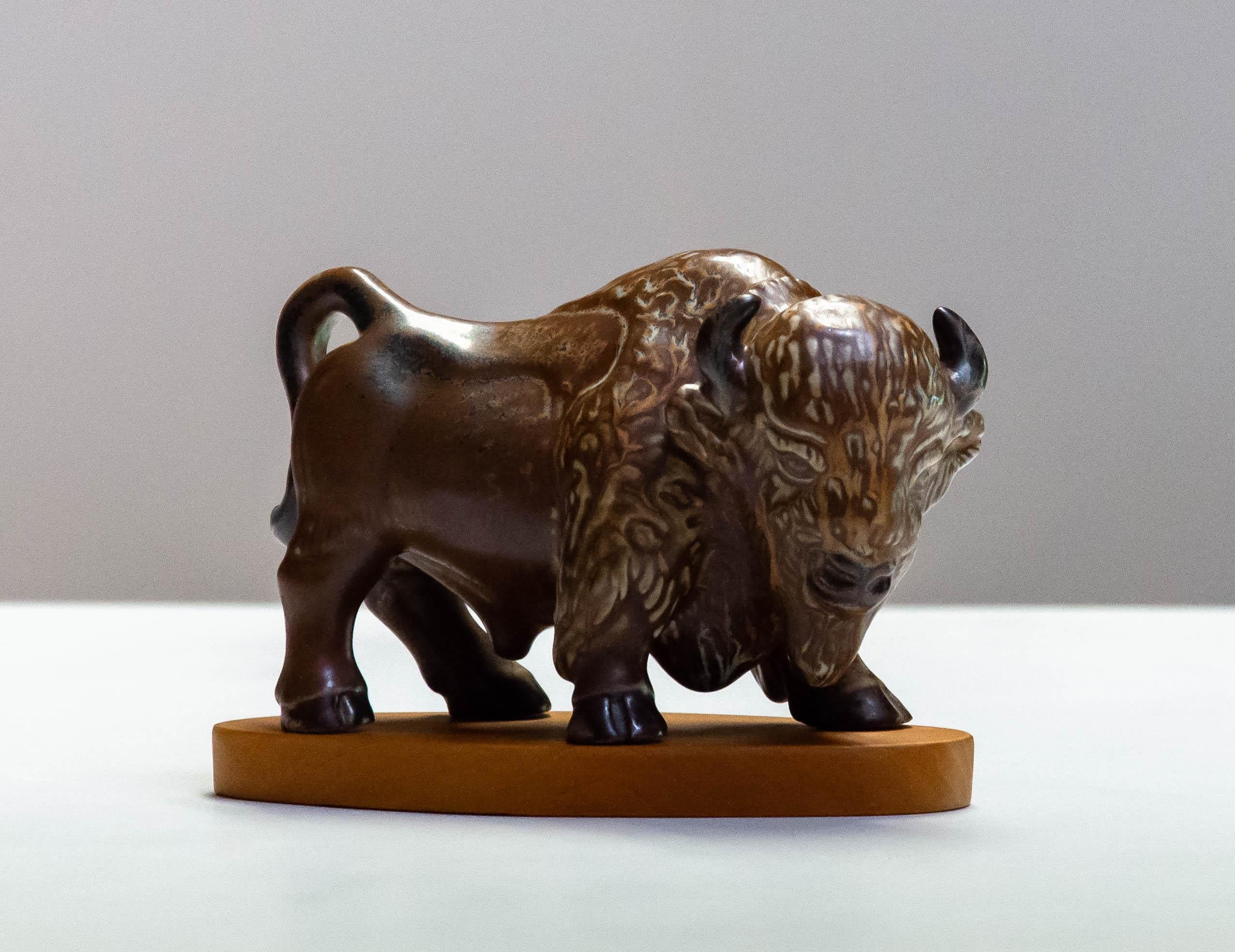 Beautiful and very rare stoneware / chamotte brutalist bull designed by Gunnar Nylund for the famous Swedish Rörstrand. 
The bull is colored by hand and marked underneath.
Absolute in perfect condition.
