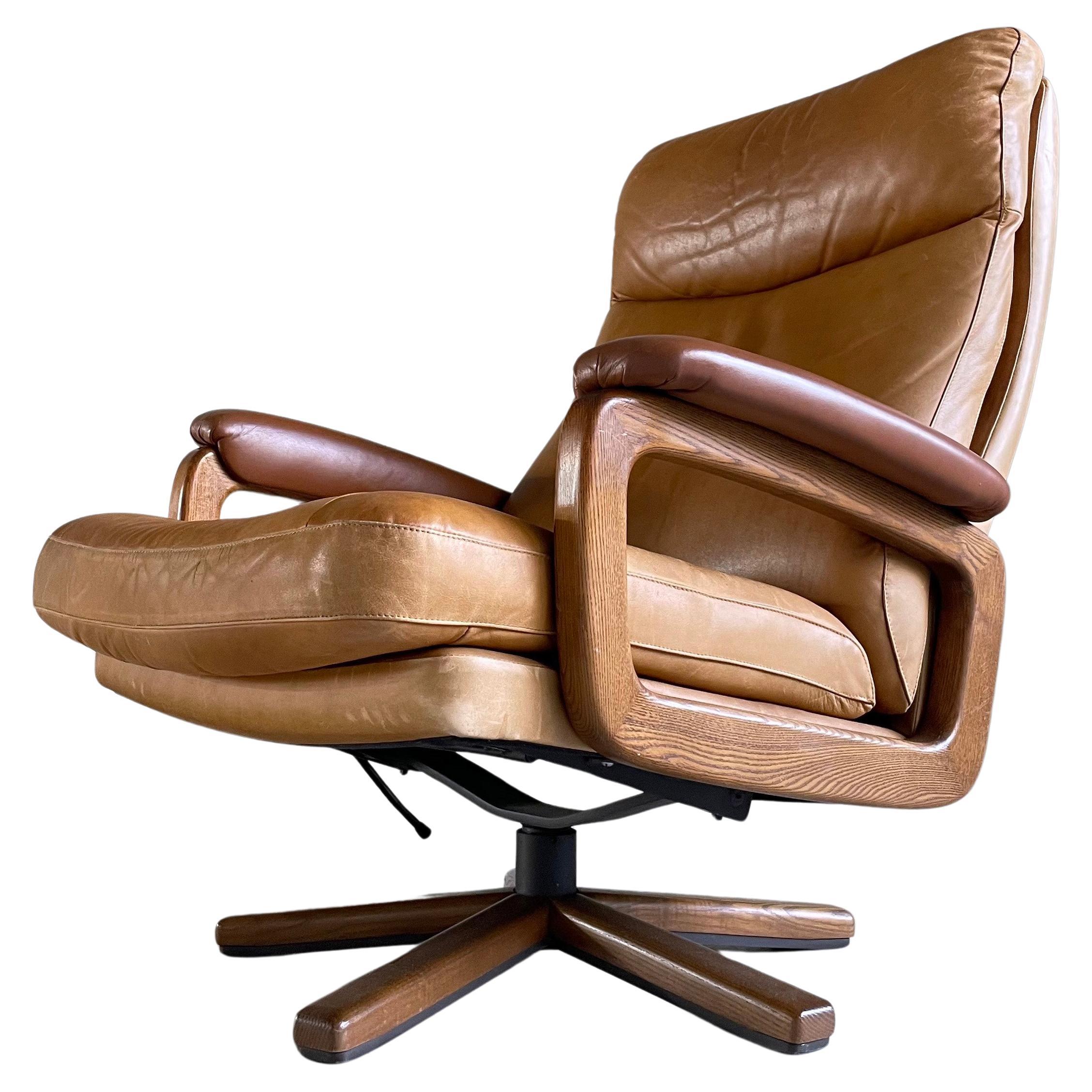 1960’s Strässle reclining leather Lounge Chair - André Vandenbeuck For Sale