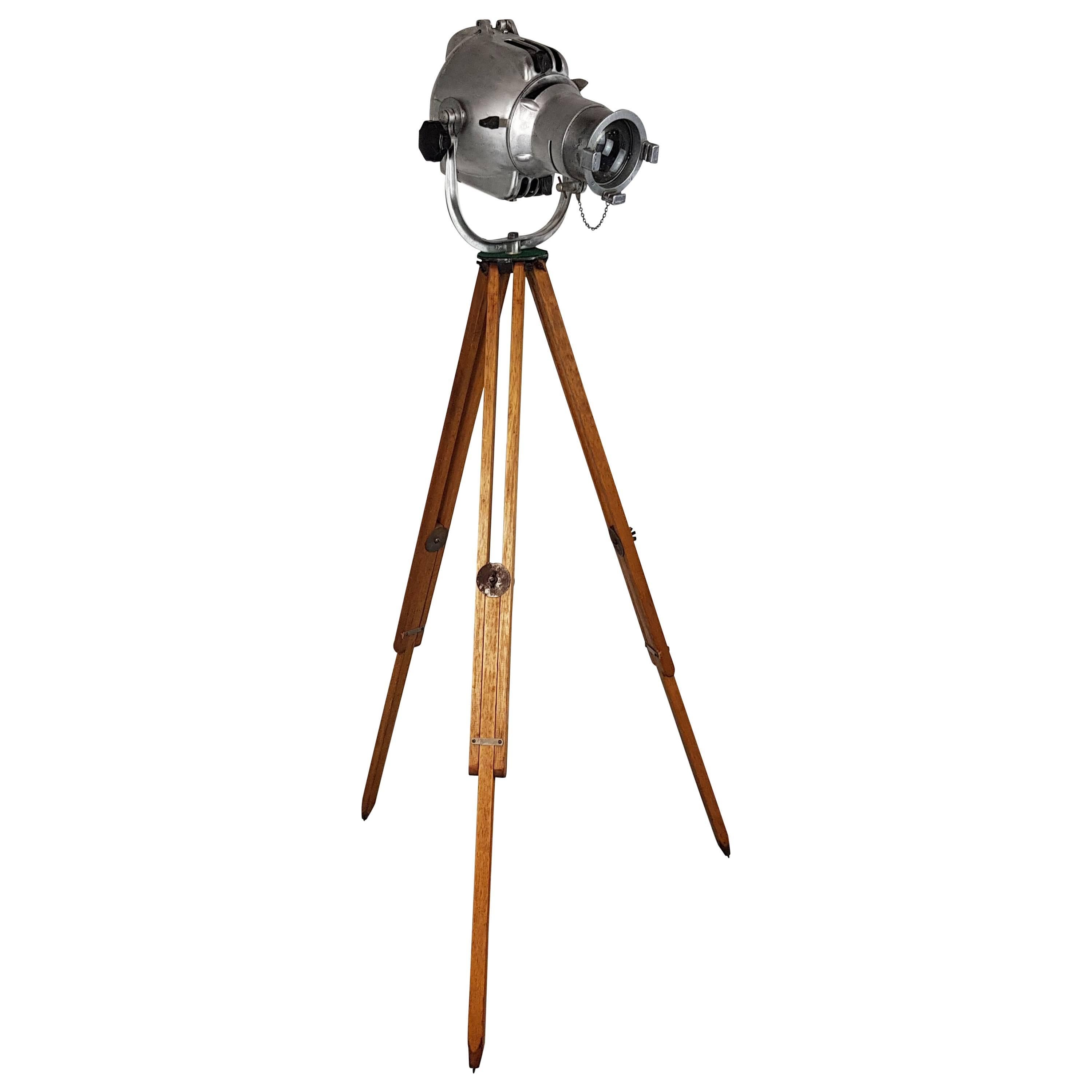 1960s Stripped and Polished Strand 23 Theatre Light on Vintage Wooden Tripod For Sale