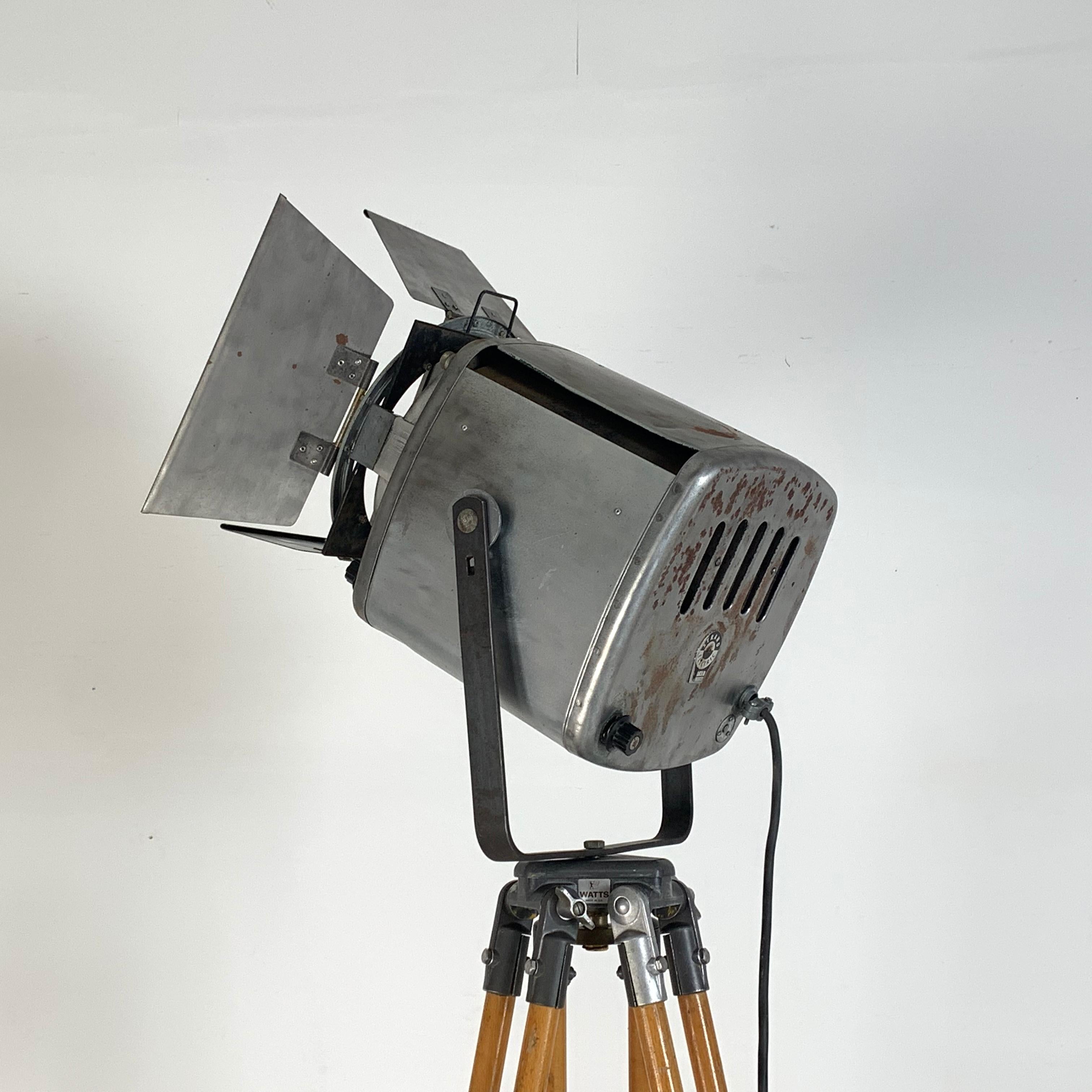 20th Century 1960s Stripped and Polished Strand 743 Theatre Light on Vintage Wooden Tripod For Sale