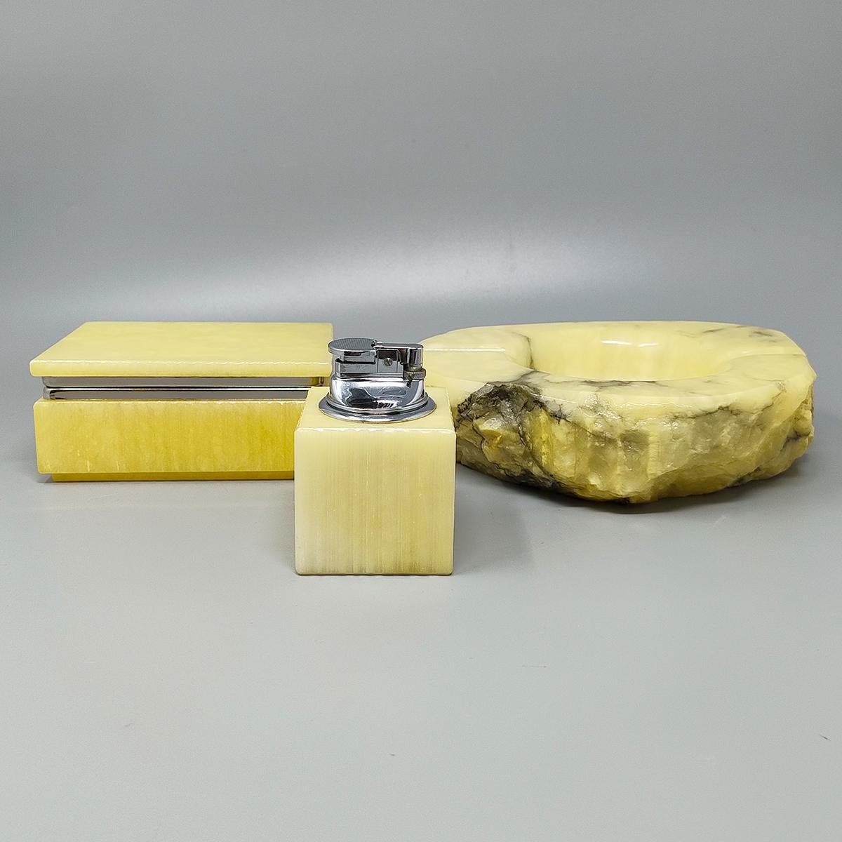1960s Gorgeous alabaster smoking set by Romano Bianchi with ashtray, box and table lighter, everything is handmade carved. Made in Italy. This smoking set is in excellent condition.
Dimension :
Ashtray 7,87 cm x 6,69 cm x 2,36 H inches
cm 20 x cm 17