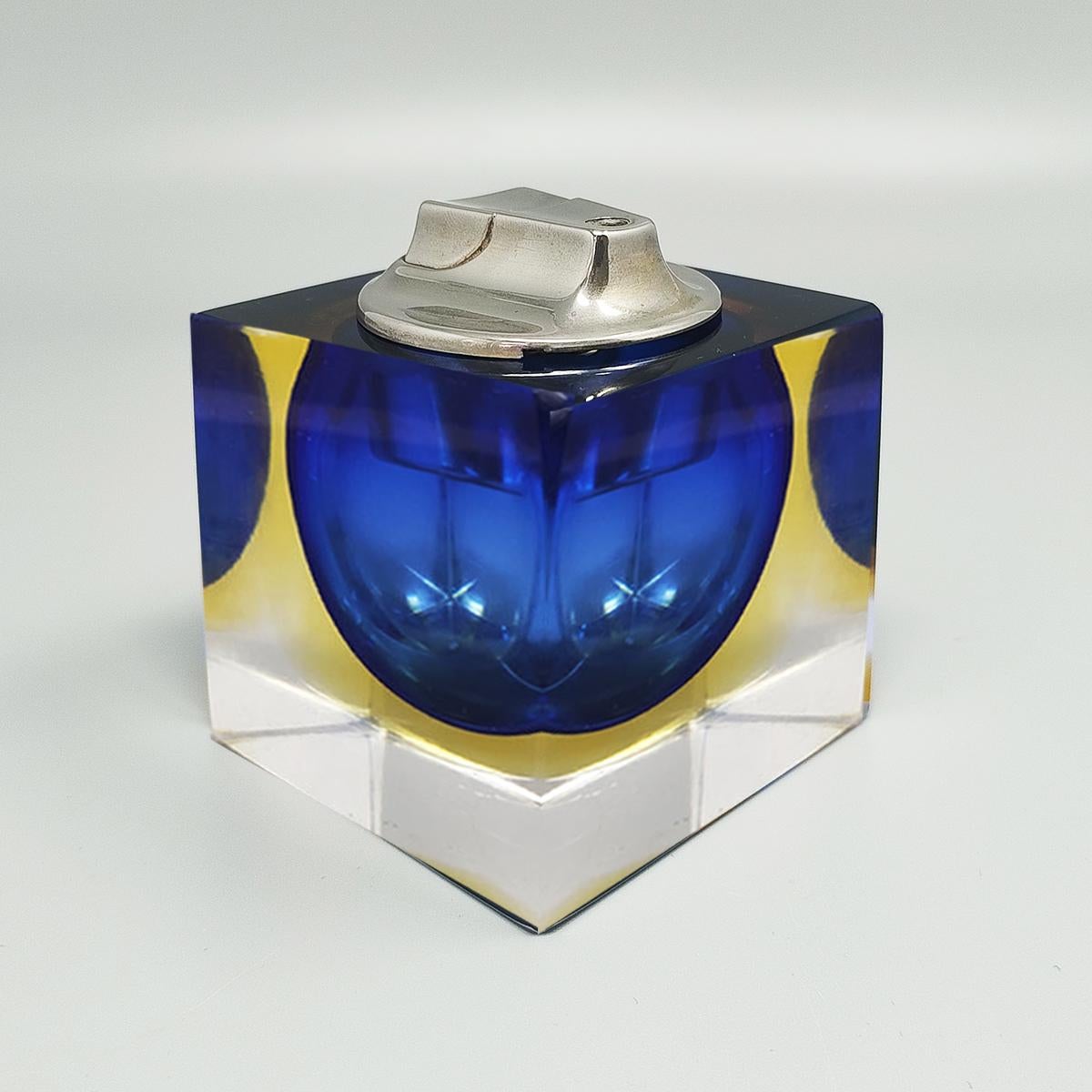 1960s Stunning Blue and Yellow Table Lighter in Murano Sommerso Glass By Flavio Poli for Seguso. Made in italy
The item is in excellent condition and it works perfectly
Dimension:
2,75 x 2,75 x 3,14 H inches
cm 7 x cm 7 x cm 8 H