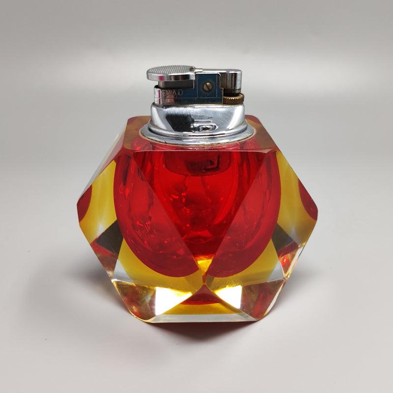 1960 Stunning  Red and Yellow Table Lighter in Murano Sommerso Glass By Flavio Poli for Seguso. Made in italy. The item is in excellent condition and it works perfectly
Dimension:
diam 4,33