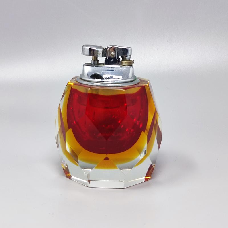 1960 Stunning  red and yellow table lighter in Murano Sommerso Glass by Flavio Poli for Seguso. Made in italy. The item is in excellent condition and it works perfectly
Dimension:
diam 3,54