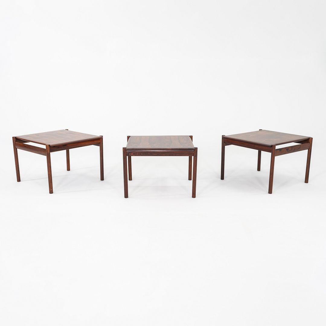 These are Square Rosewood Side or End Tables, designed by Sven Ivar Dysthe for Dokka Mobler in Norway in the 1960s. The listed price includes one table, and we have three tables available for purchase. Their tops showcase varied undulating grain