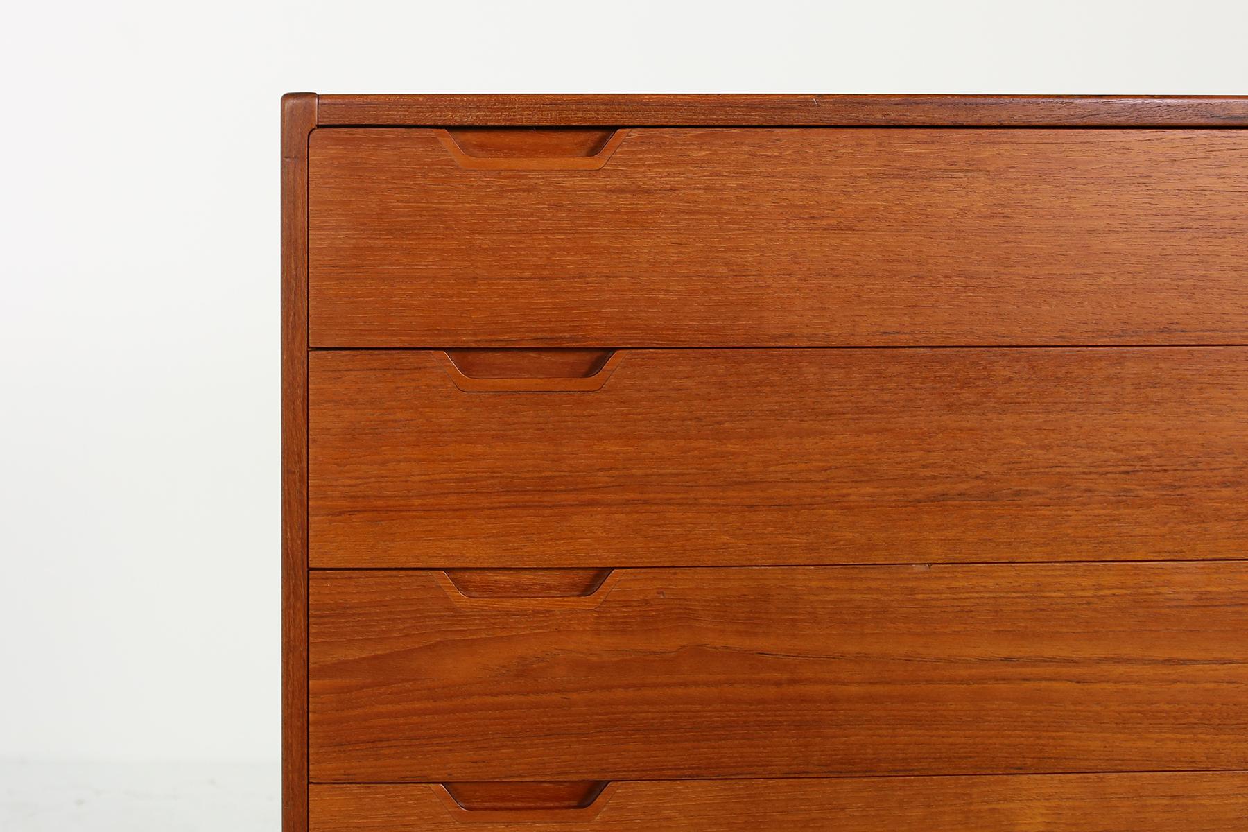 Super rare and beautiful Danish modern design Svend Langkilde chest of six drawers in a fantastic condition. This is a very rare model in authentic condition, from the 1960s Danish modern design. Beautiful shades of the teak, solid drawers. Produced