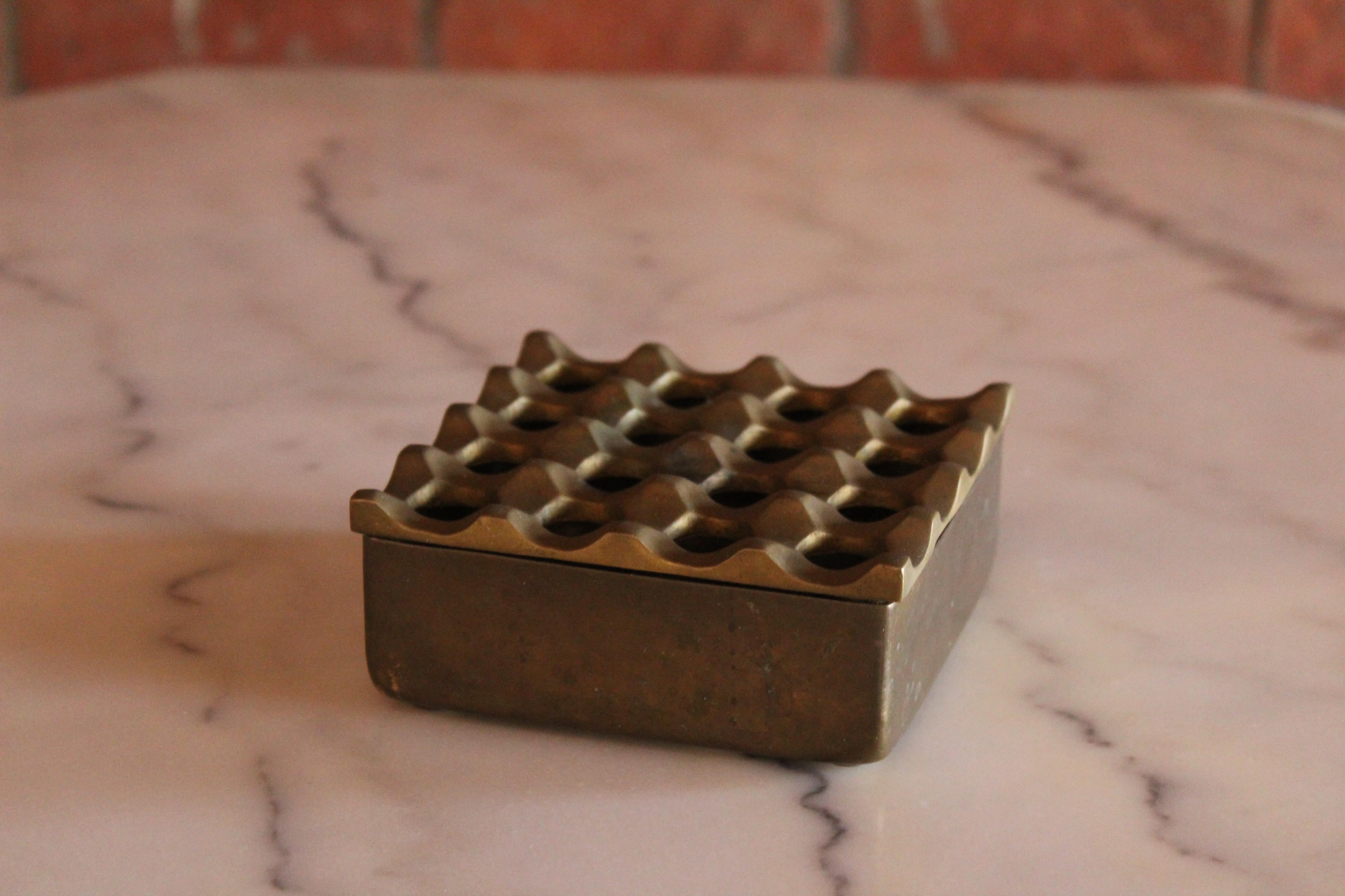 A vintage Ljungberg & Bäckström Ultima ashtray in solid brass. Made for Various Ting and designed by Holger Bäckström &Bo Ljungberg in the 1960s- made in Sweden. Wonderful condition with patina.