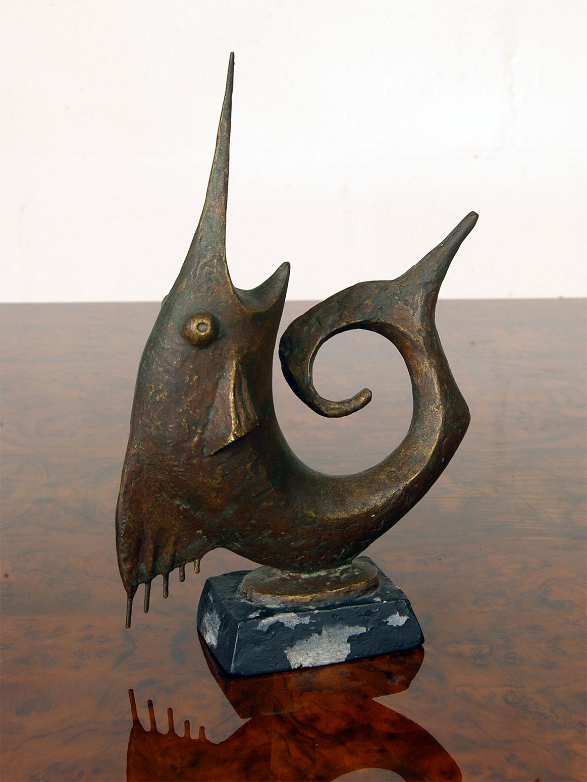 Limited edition ceramic sculpture entitled ‘Marlin Thrusting’ by Swedish sculptor Hjalmar Wilhelm Ekberg, 1924-1980. Has a reinforced metal bill and dorsal fin set into the ceramic and is painted to resemble verdigris on bronze.
Stamped to the side