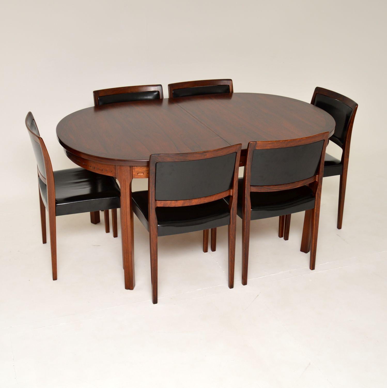 An excellent vintage Swedish dining table and chairs. They were designed by Nils Jonsson, and were made in Sweden by Troeds in the 1960’s.
The quality is superb, this is a stunning set with a beautiful design. The chairs are solid wood with leather