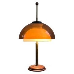 1960s table lamp, by Reggiani, with a white glass and brown plexiglass diffuser
