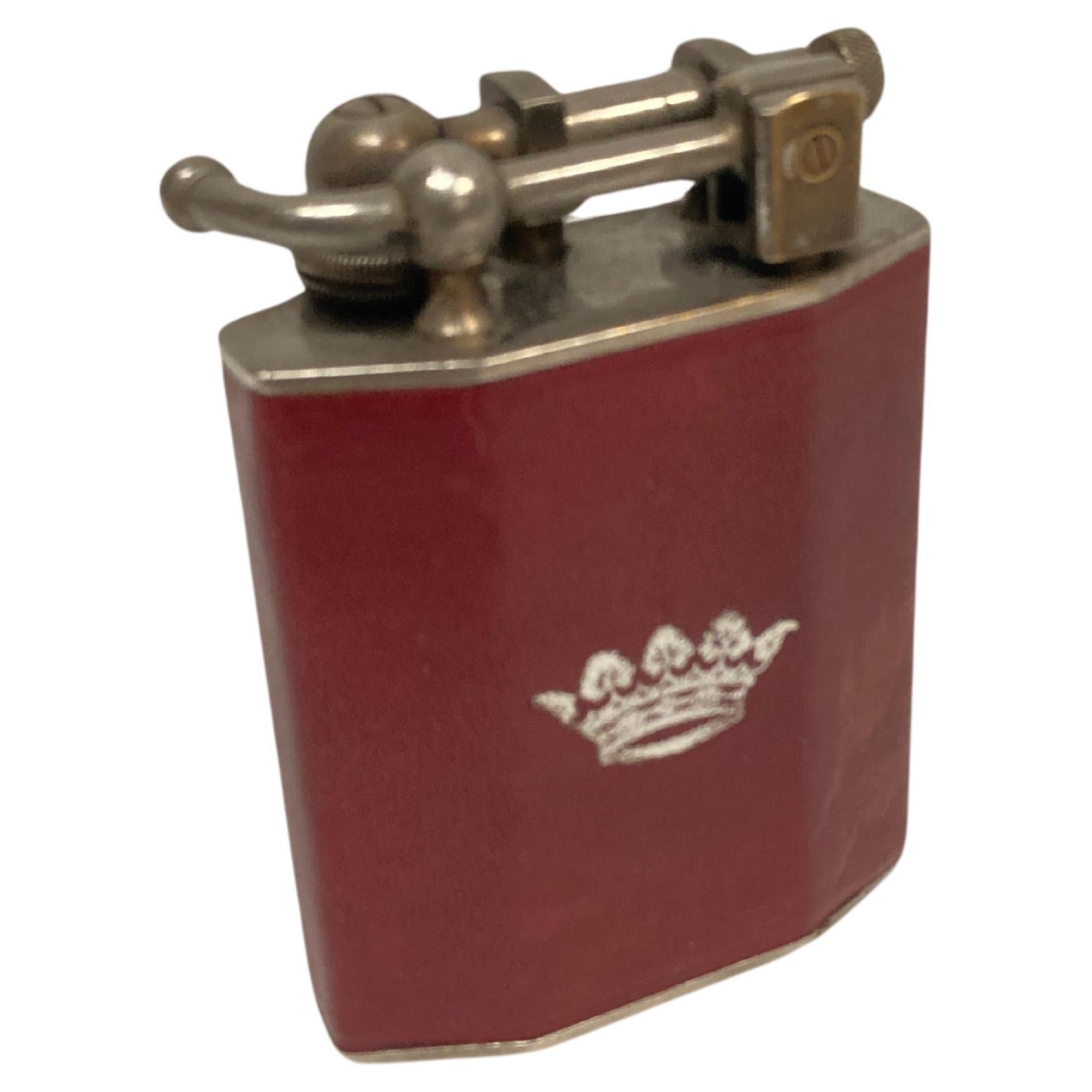 1960's table lighter in leather with a crown emblem  For Sale