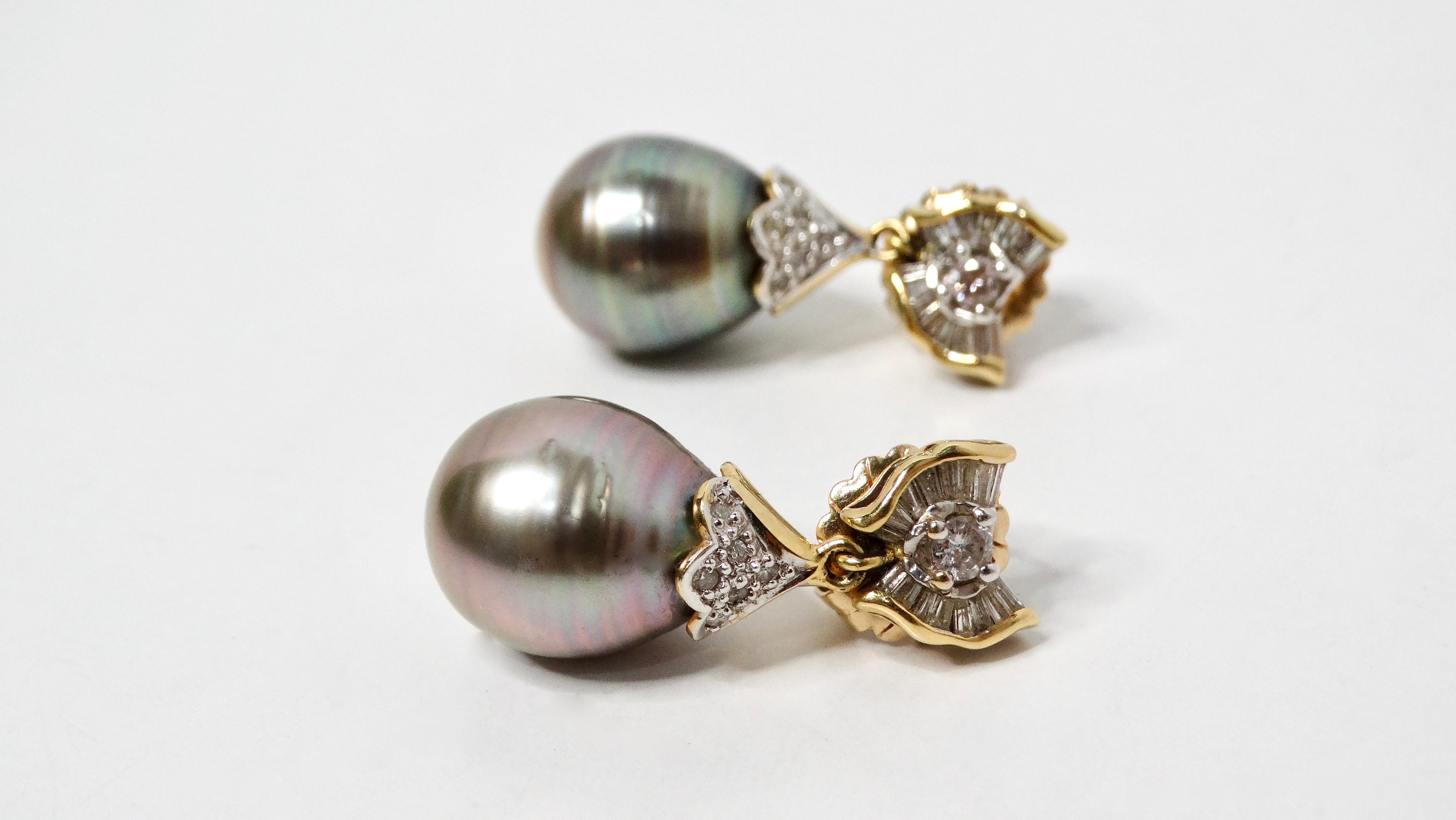 Introducing these exquisite 1960s Tahitian Pearl Dangle Earrings, a stunning embodiment of luxury and timeless elegance. Crafted in solid 14k yellow gold, these earrings feature a bow-shaped top embellished with intricately set small diamonds,