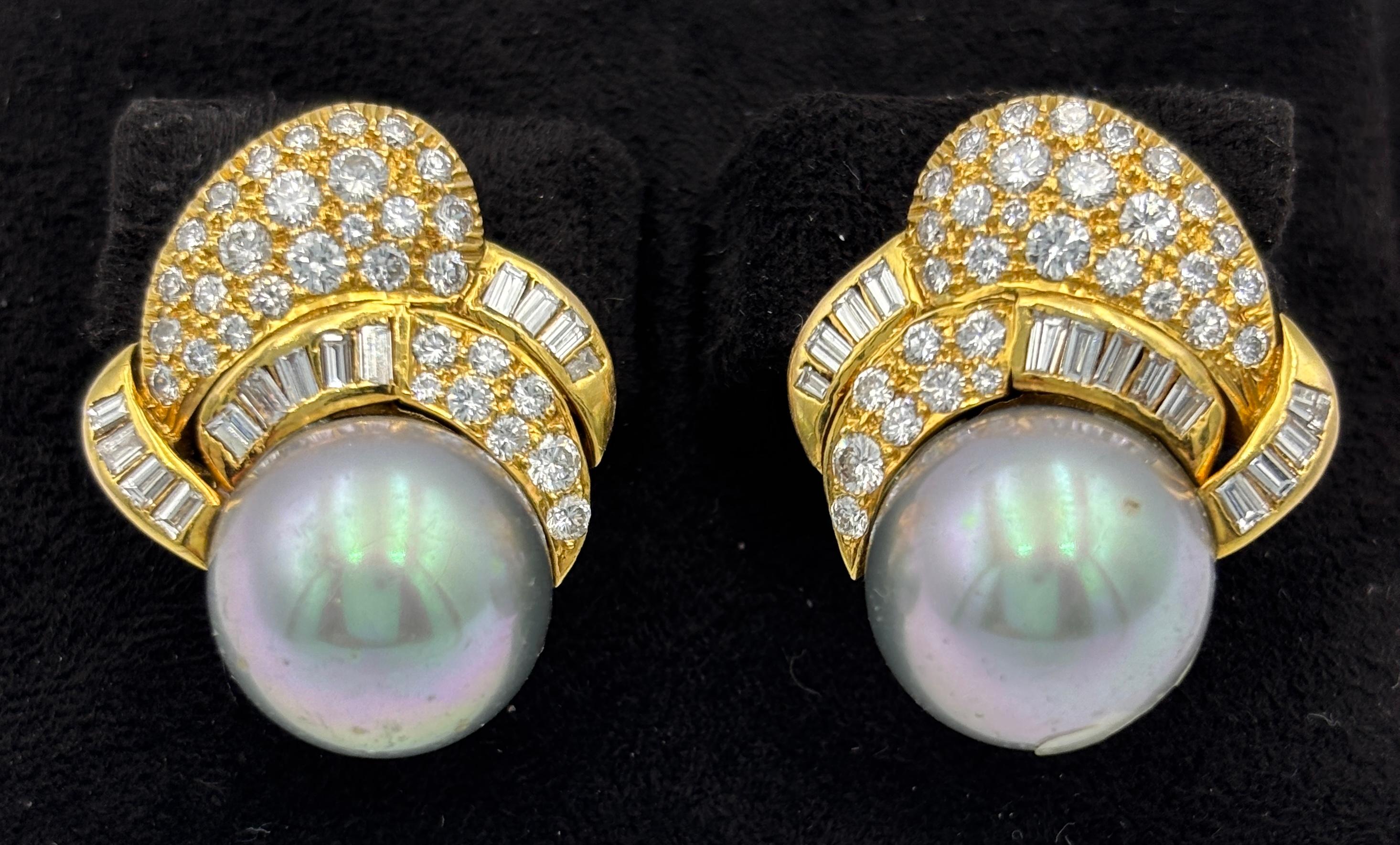 These delightful 1960s Italian stud earrings are made up of Tahitian pearls and round cut and tapered baguette diamonds totalling approximately 2 carats. The pearls measure 12mm in diameter. They are a stunning pair.