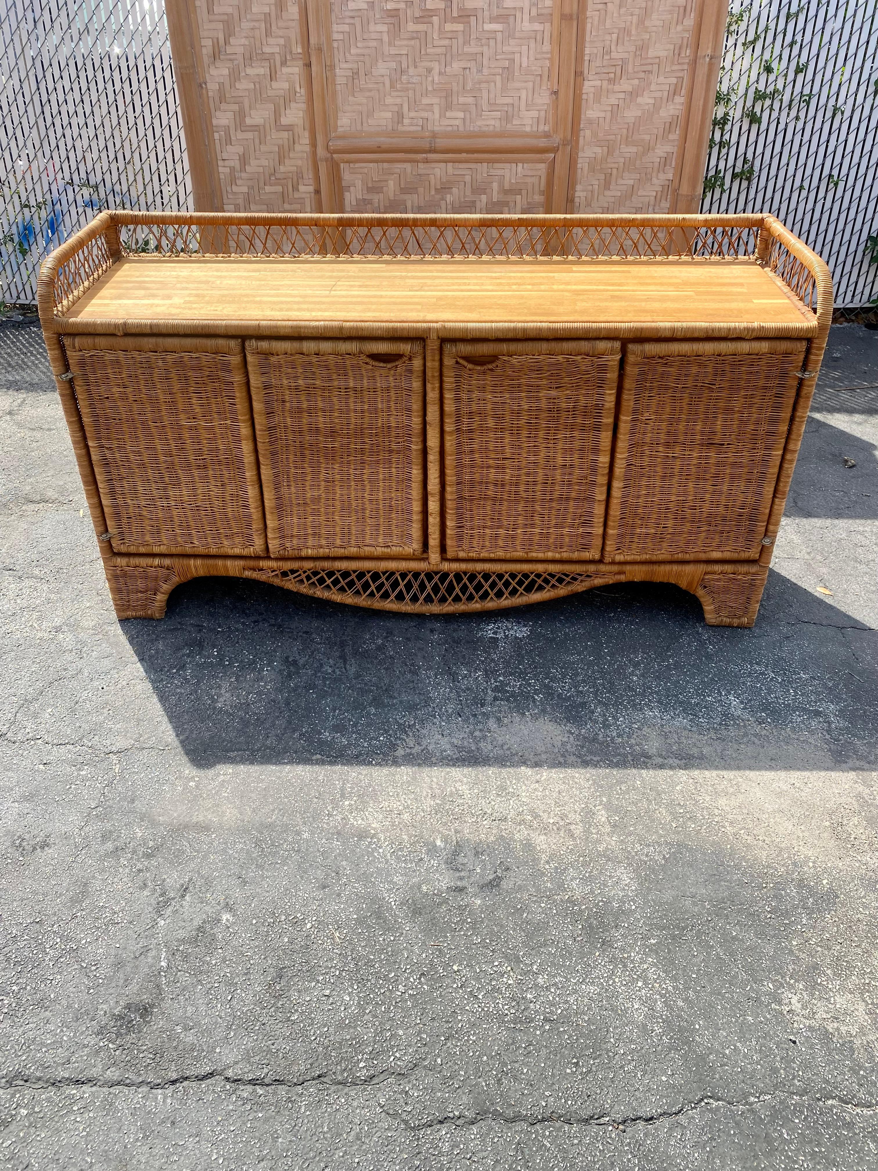 On offer on this occasion is one of the most stunning and rare, rattan and stacked teak wood design dresser you could hope to find. Outstanding design is exhibited throughout. The beautiful dresser is statement piece and packed with personality!!