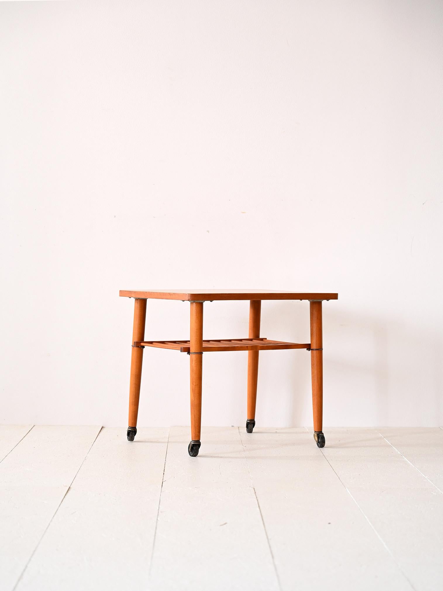 Scandinavian Modern 1960s teak coffee table with wheels For Sale