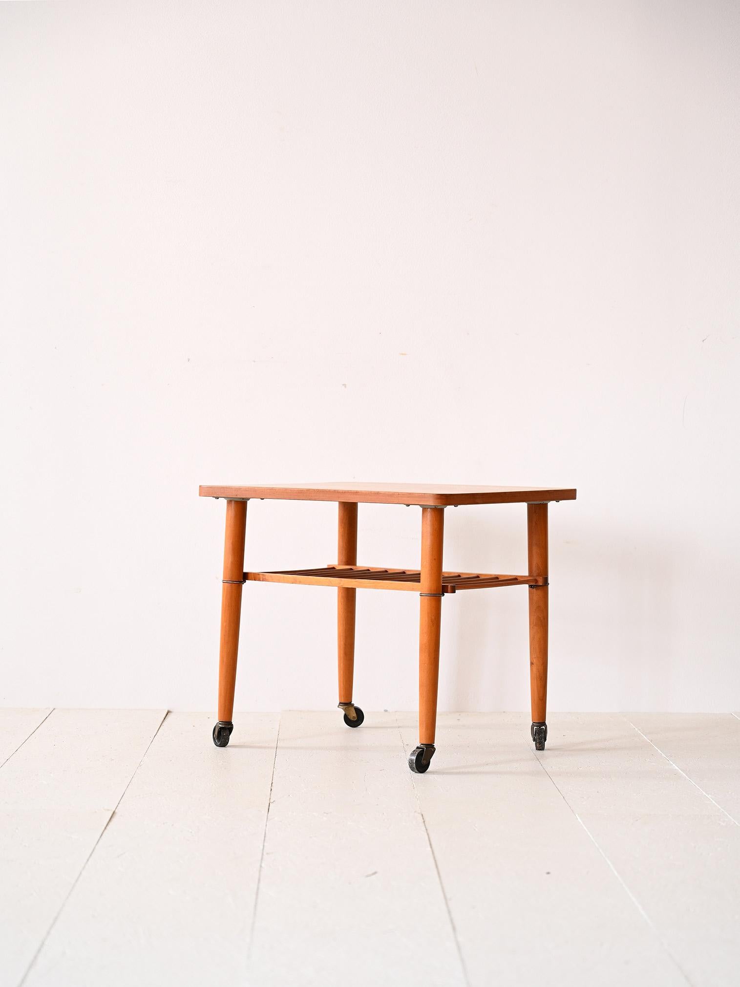 Scandinavian 1960s teak coffee table with wheels For Sale