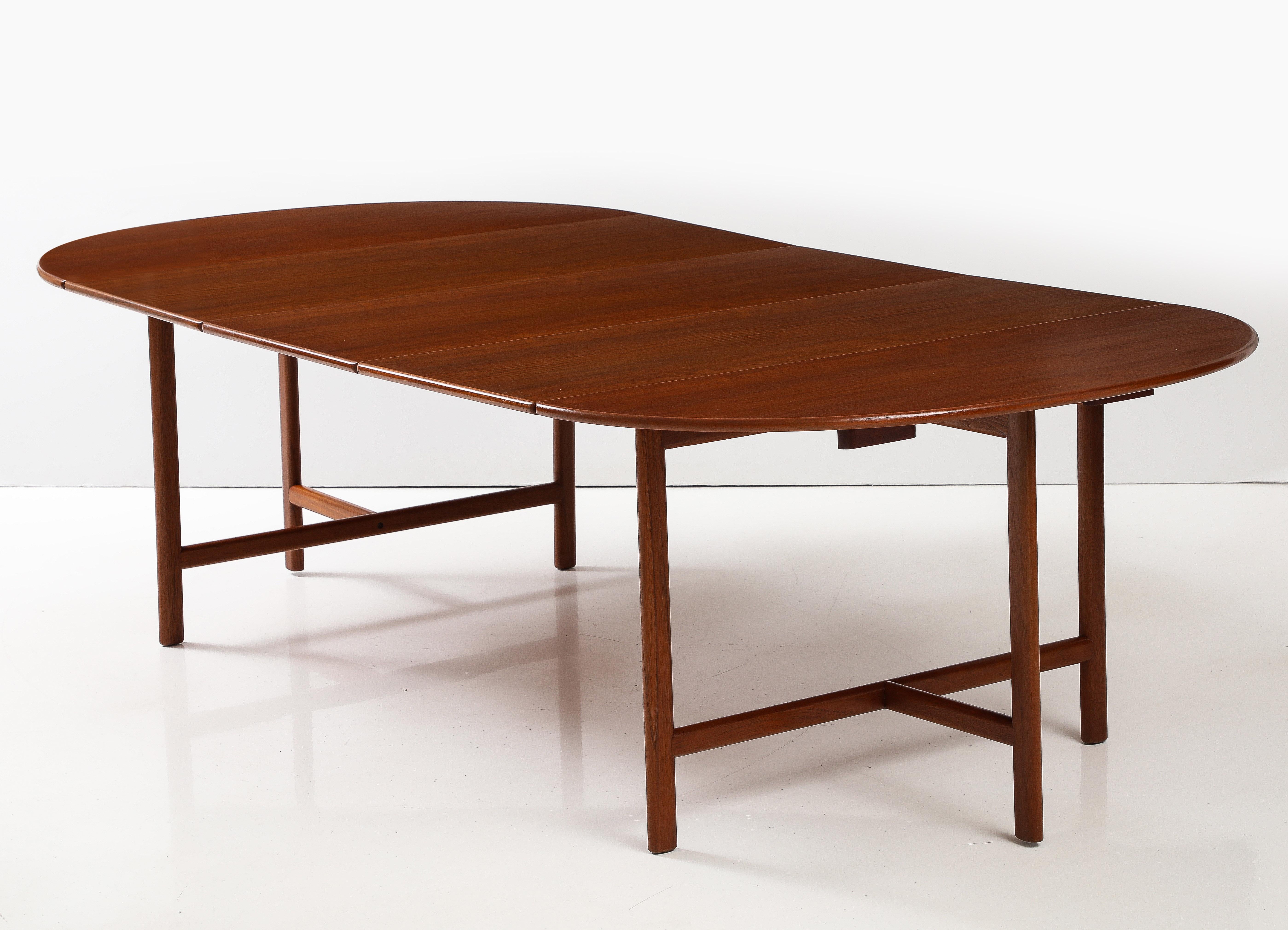 Amazing 1960's mid-century modern teak dining table with 3 leaves designed by Karl-Erik Ekselius For JOC Vetlanda, fully restored with minor wear and patina due to age and use, each leave measures 19.5 inches width.

Width without leaves is: