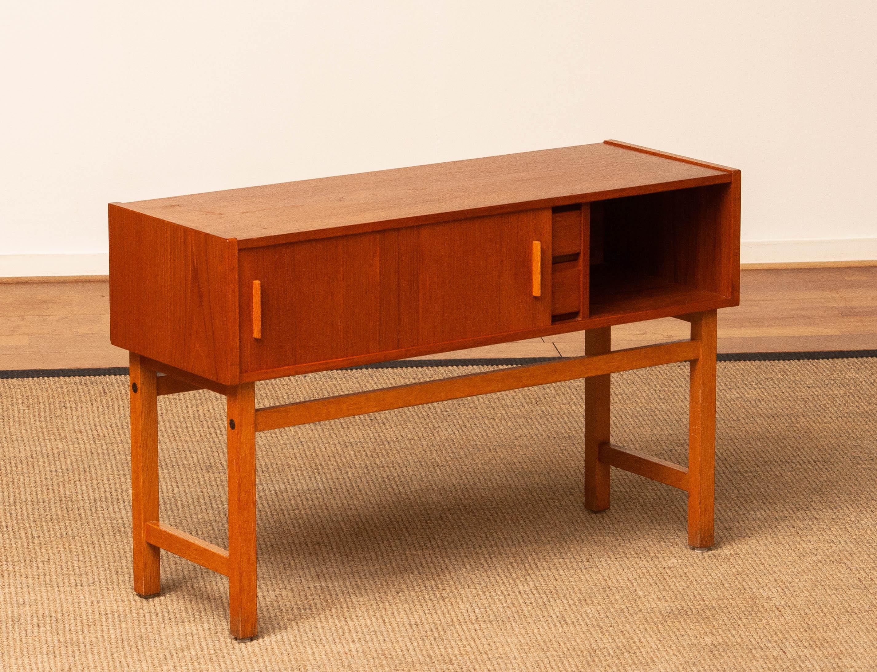Beech 1960s Teak Cabinet / Credenzas / Console With Drawers And Sliding Doors. Sweden. For Sale