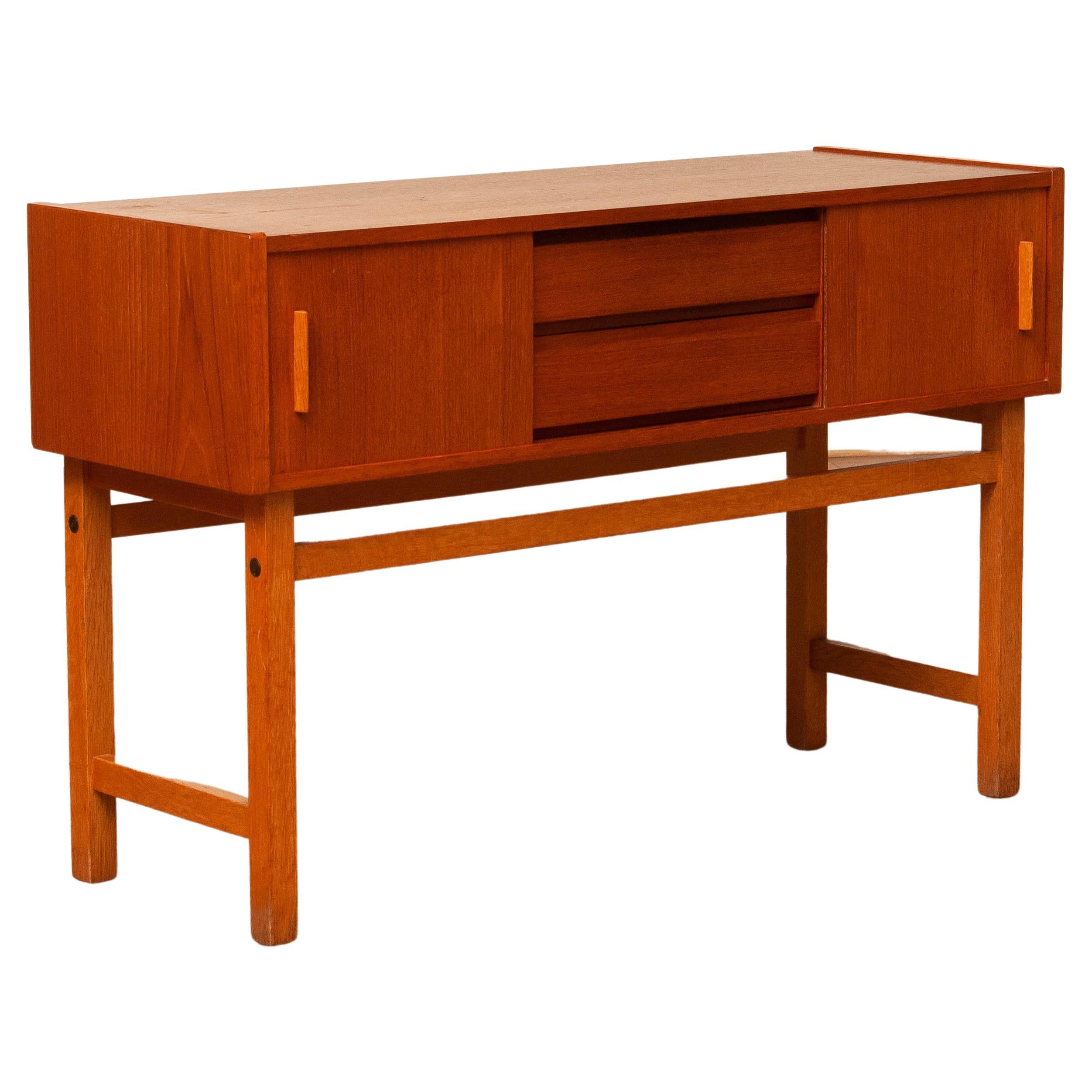 1960s Teak Cabinet / Credenzas / Console With Drawers And Sliding Doors. Sweden.