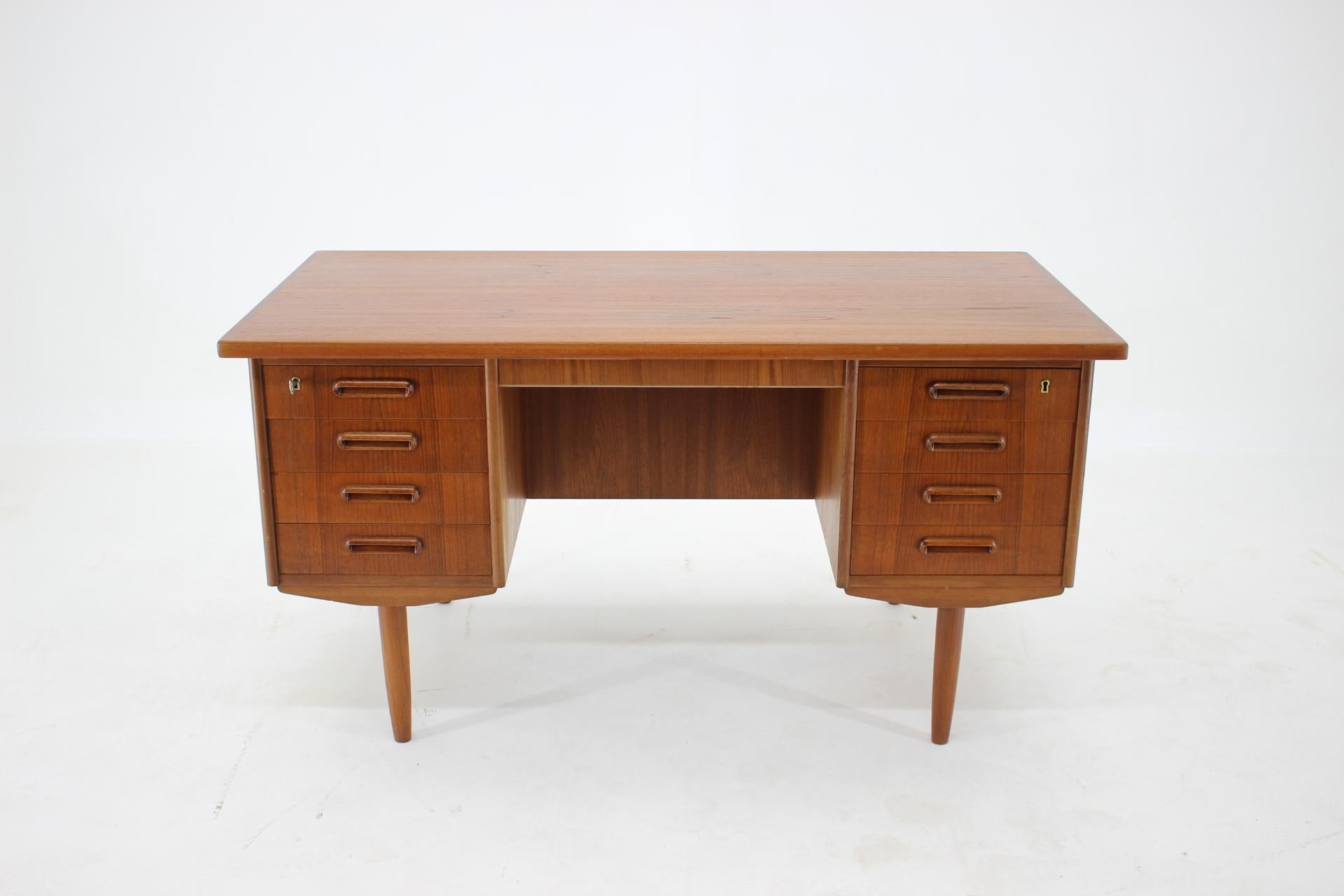 - The desk features eight drawers and in the back has storage compartment
- This item was carefully restored.