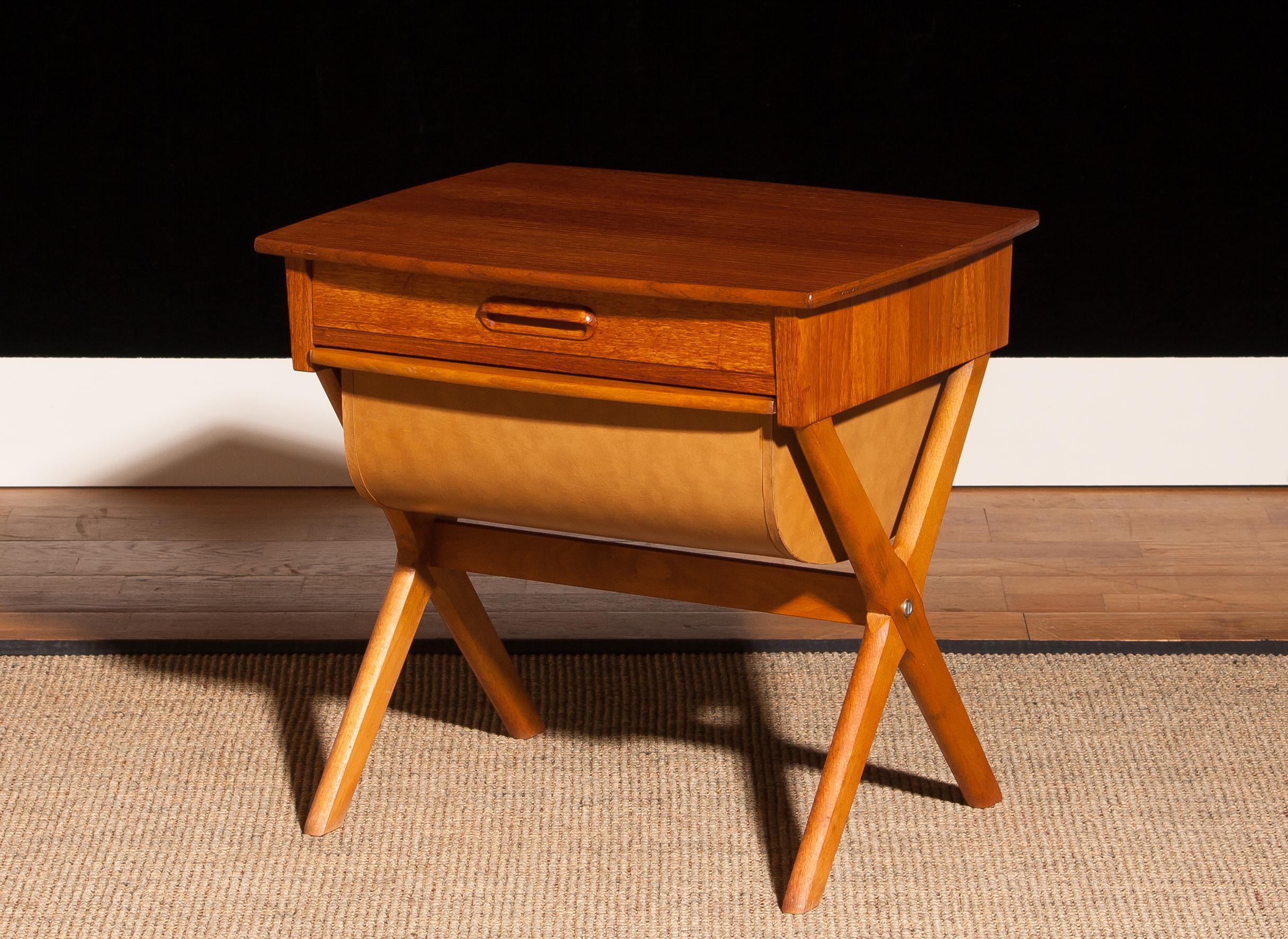 Very nice sewing table made in Sweden.
This table is made of teak and has one normal drawer and one deep drawer.
It is in a beautiful condition.
Period 1960s.
Dimensions: H 52 cm, W 52 cm, D 45 cm.