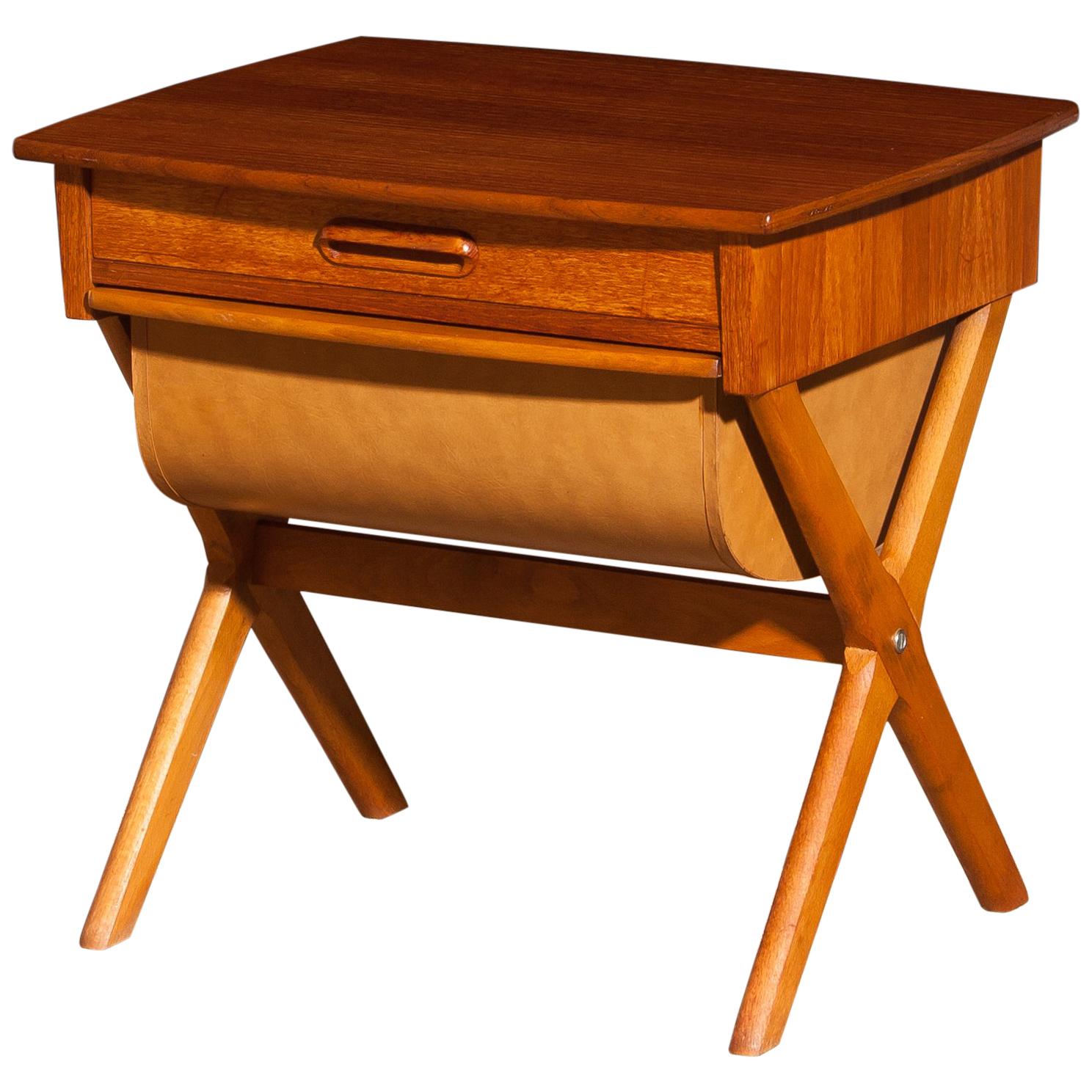 Very nice sewing table made in Sweden.
This table is made of teak and has one normal drawer and one deep drawer.
It is in a beautiful condition.
Period 1960s.
Dimensions: H 52 cm, W 52 cm, D 45 cm.