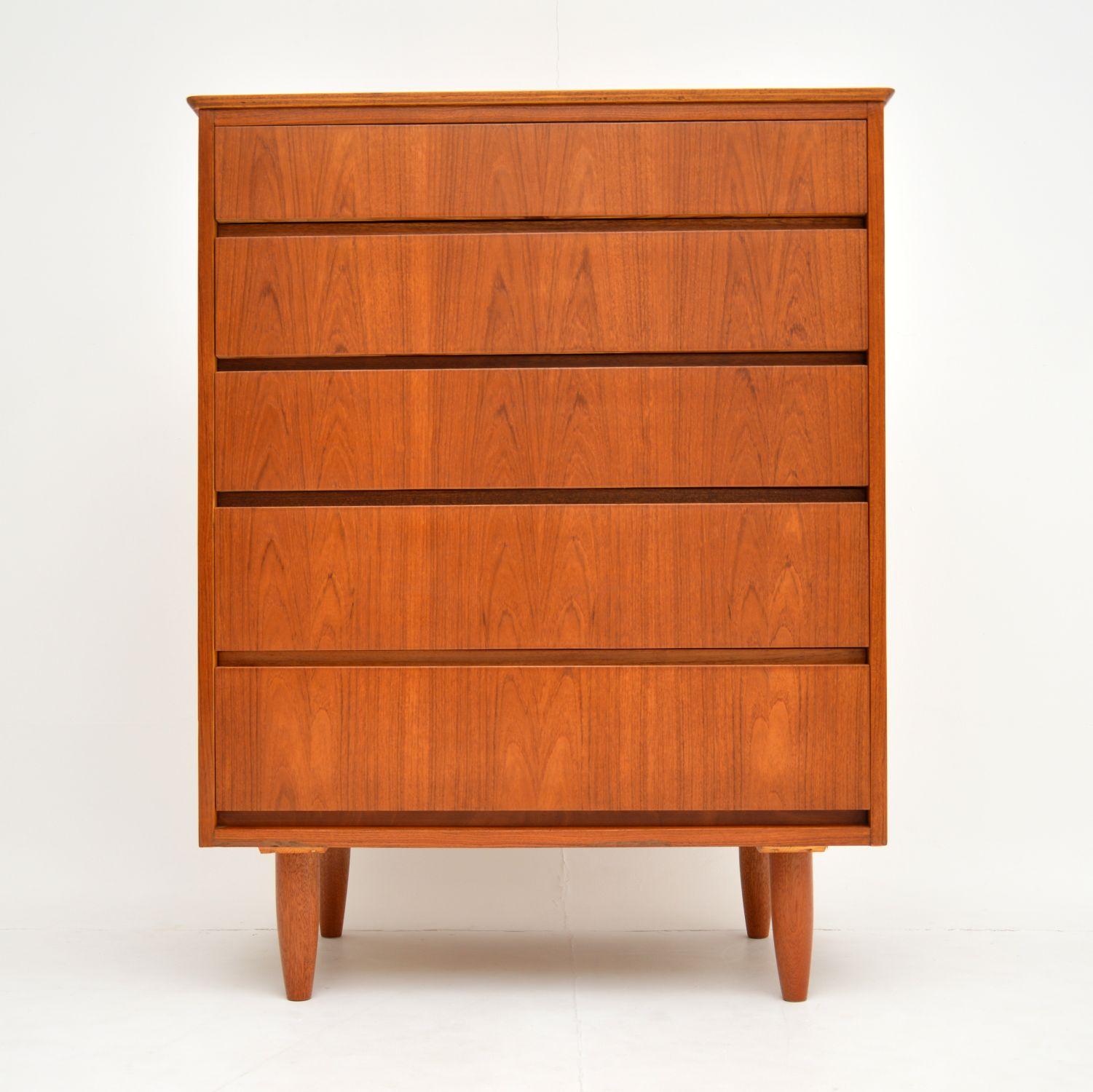 A smart and stylish vintage chest of drawers in teak, this dates from the 1960s.

It is of nice quality and has a beautiful minimal design, with plenty of storage space.

We have had this stripped and re-polished to a very high standard, the