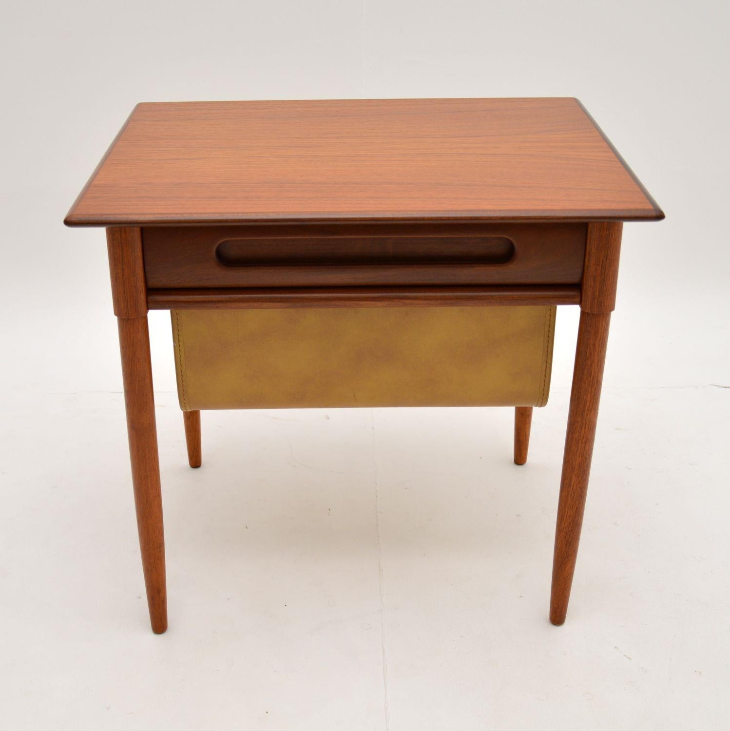 A stunning vintage teak work box side table, made in Norway in the 1960’s. This was designed by Karl Edvard Korseth for Rybo.

It is a very useful piece, originally designed as a sewing work box. The upper drawer contains fitted plastic