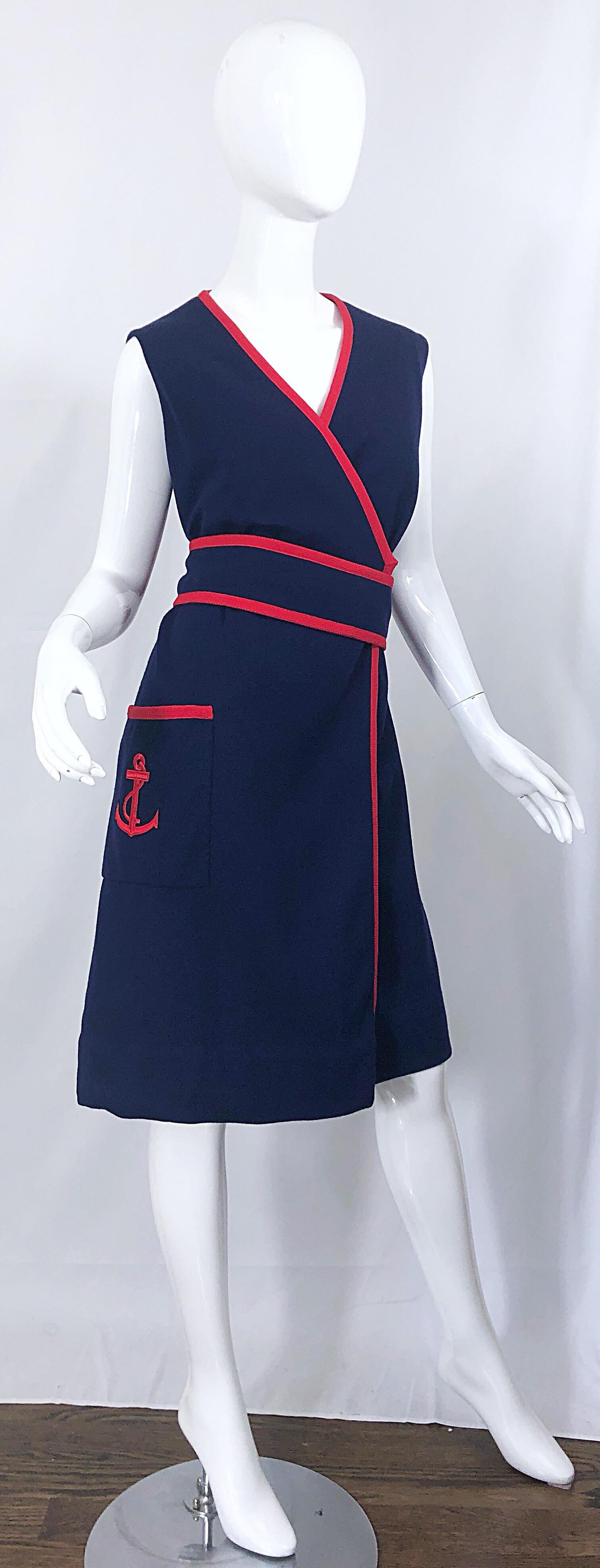 Chic 1960s TEAL TRAINA larger size navy blue and red nautical 'anchor' belted wool wrap dress!   Features a soft navy blue virgin wool with red accents. Red anchor embroidered at the left hip pocket. Interior side button closure, with hook-and-eye