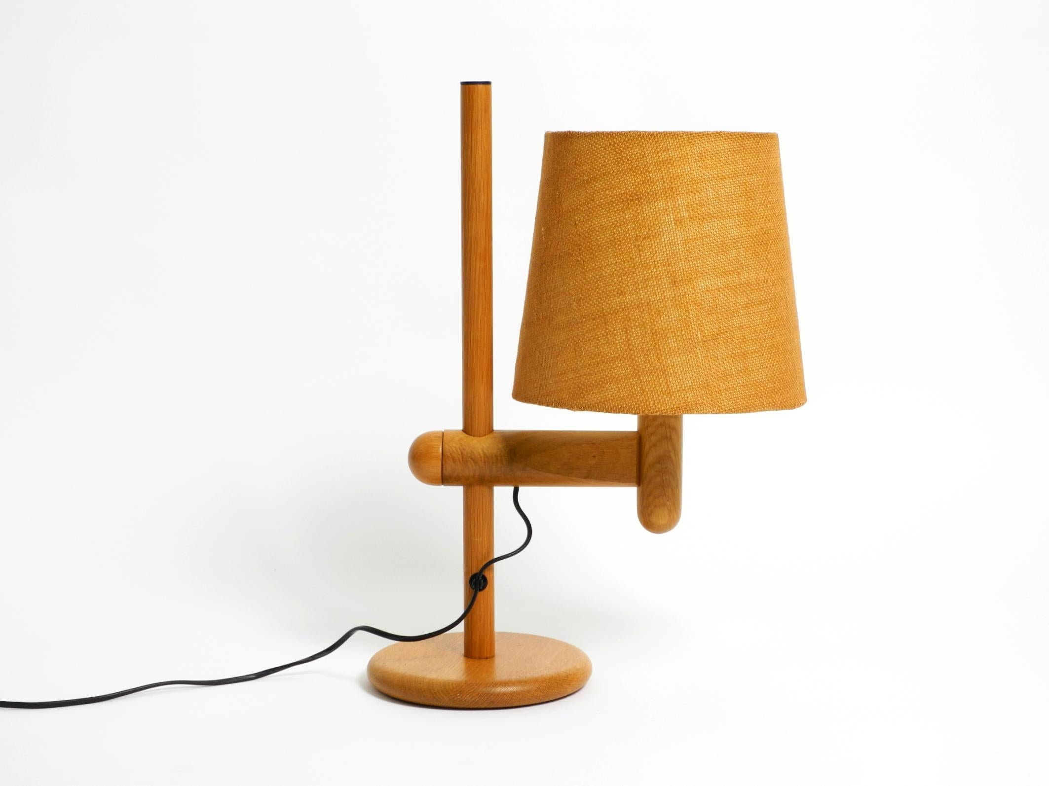 German 1960s Temde table lamp made of oak wood and with height-adjustable shade For Sale