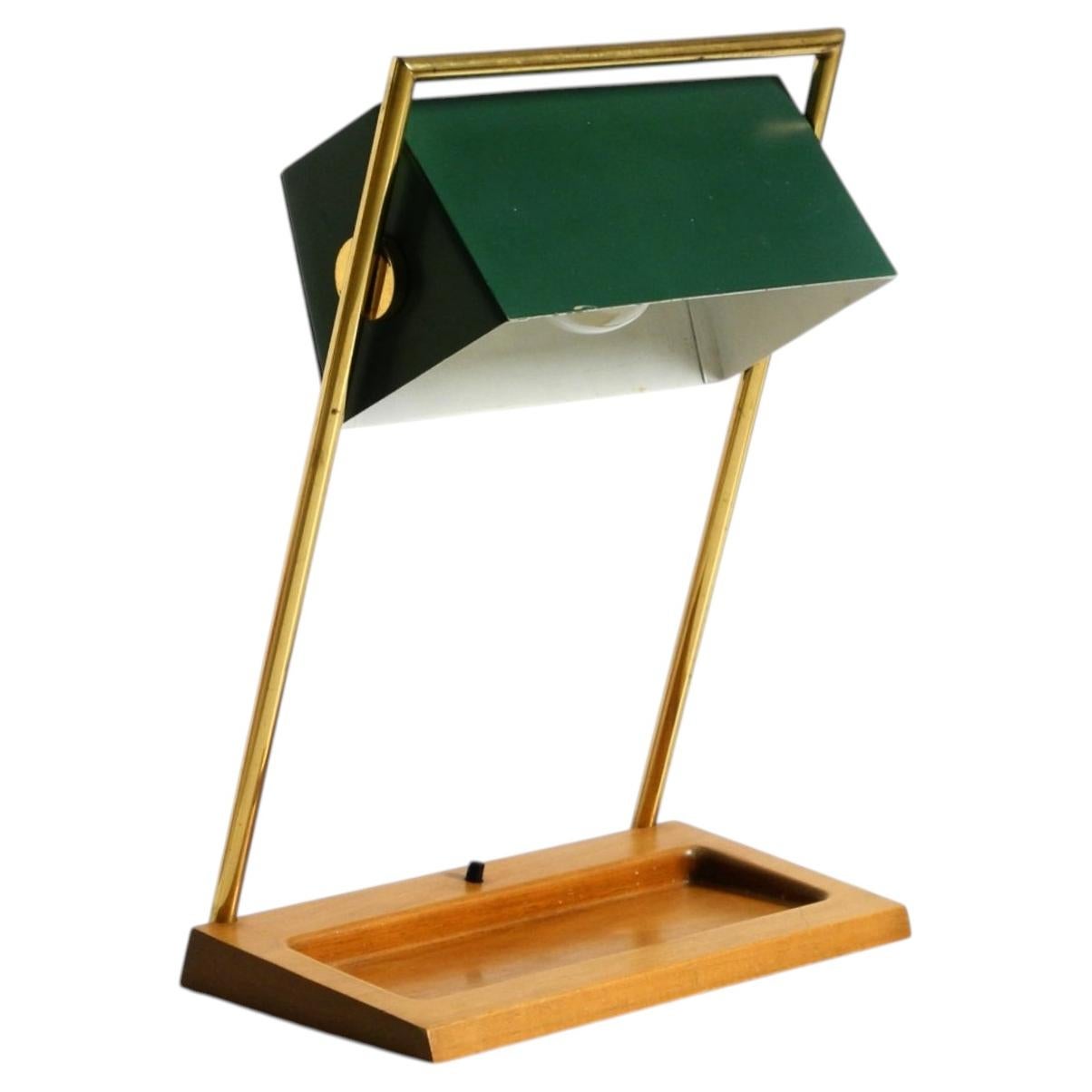 1960s Temde table lamp with a brass frame, teak base, and green lampshade